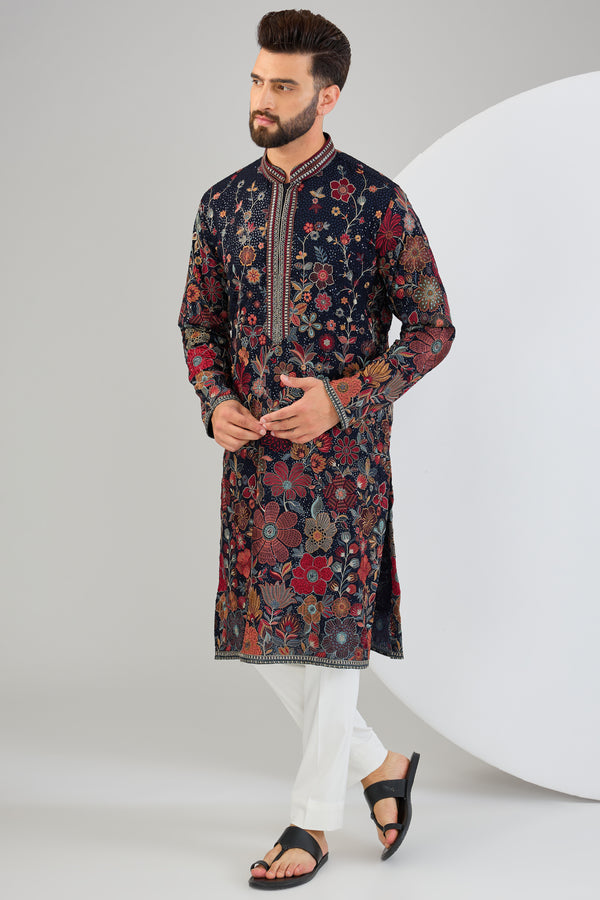 Navy blue chikankari kurta with floral embroidery.