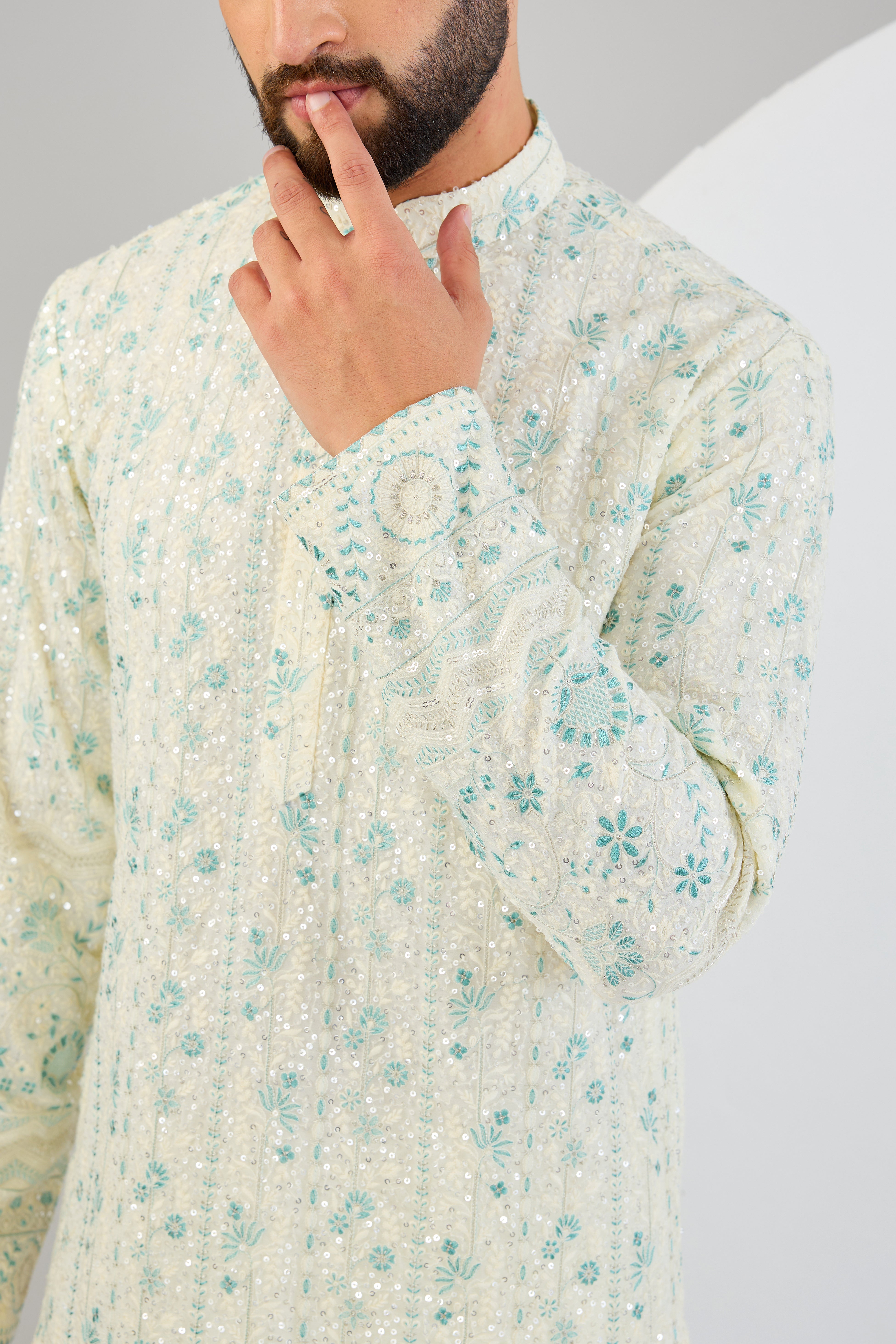 Cream chikankari kurta with intricate floral embroidery. - kasbahmen