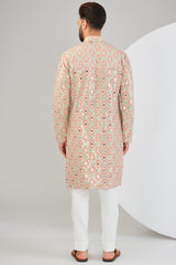 Signature cream mirror-work kurta with intricate mulit-thread work and zari-detailing.