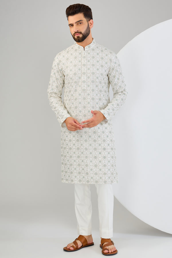 Ivory chikankari kurta with intricate multi-thread and zari work. - kasbahmen