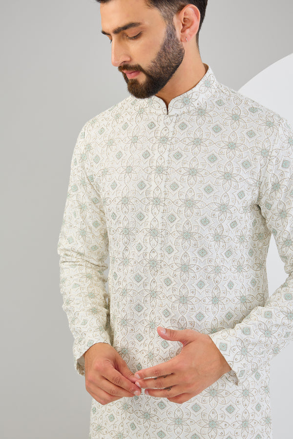 Ivory chikankari kurta with intricate multi-thread and zari work. - kasbahmen