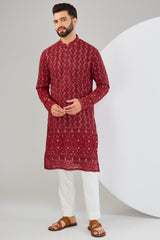 Red chikankari kurta with detailed sequin and zari embellishment. - kasbahmen