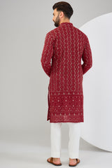 Red chikankari kurta with detailed sequin and zari embellishment. - kasbahmen