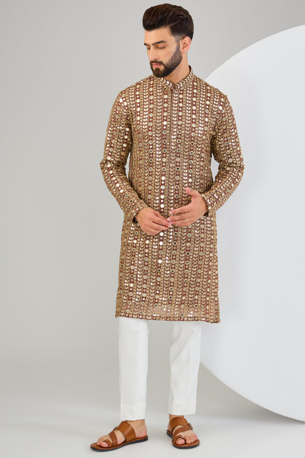 Dark brown mirror work with heavy golden zari embroidery. - kasbahmen