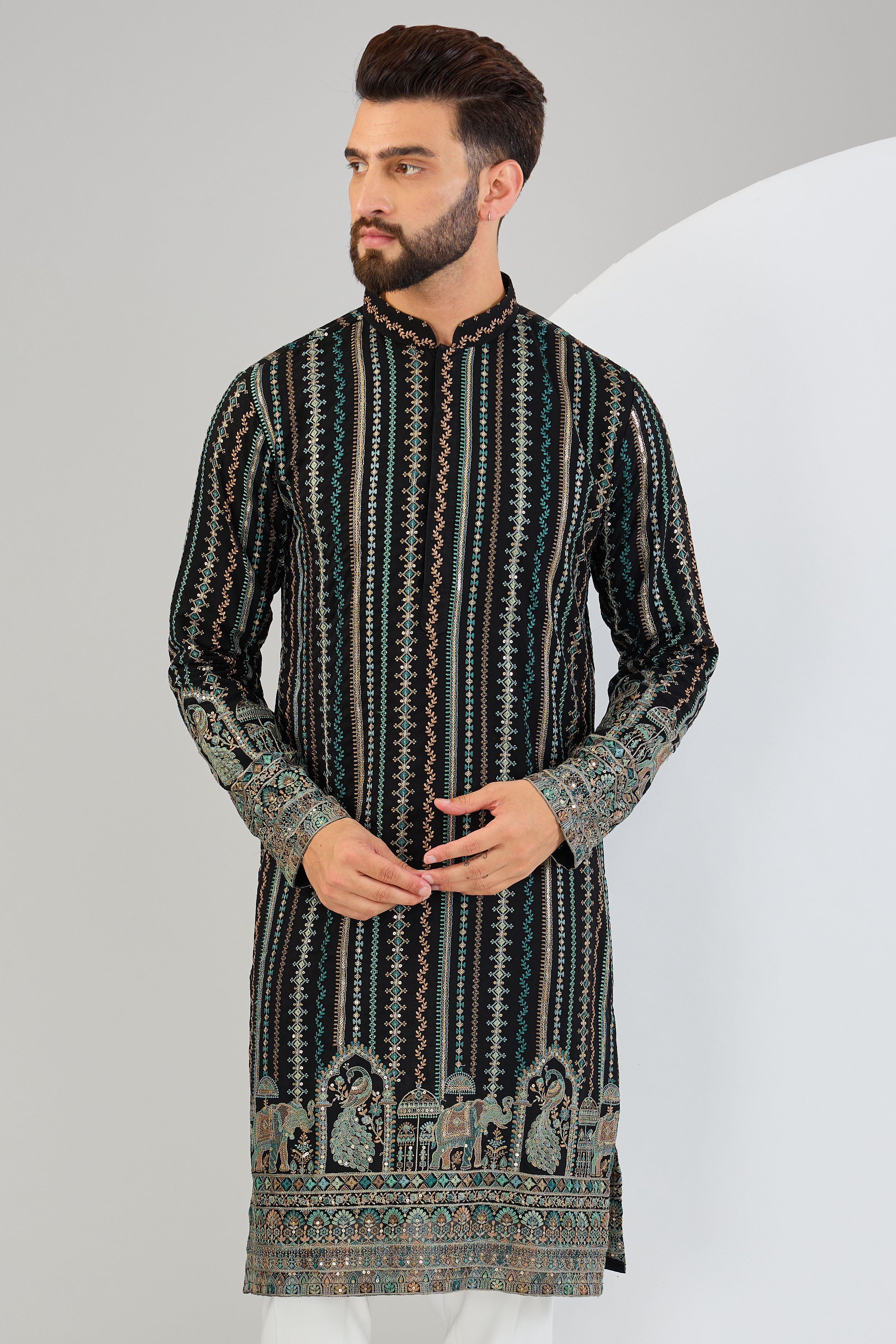 Black chikankari kurta with intricate multi-thread work and detailed kalamkari work on the ghera. - kasbahmen