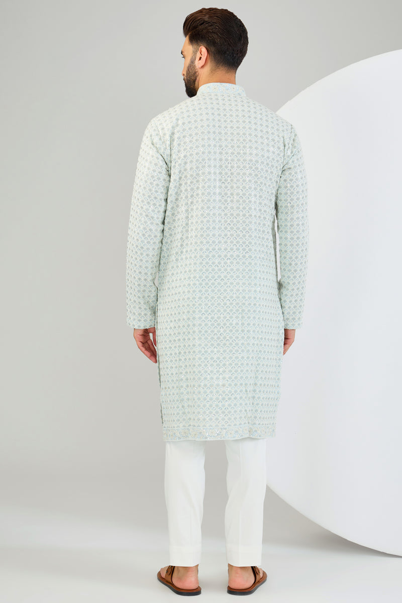 Powder blue chikankari kurta with heavy sequin work and intricate neckline. - kasbahmen