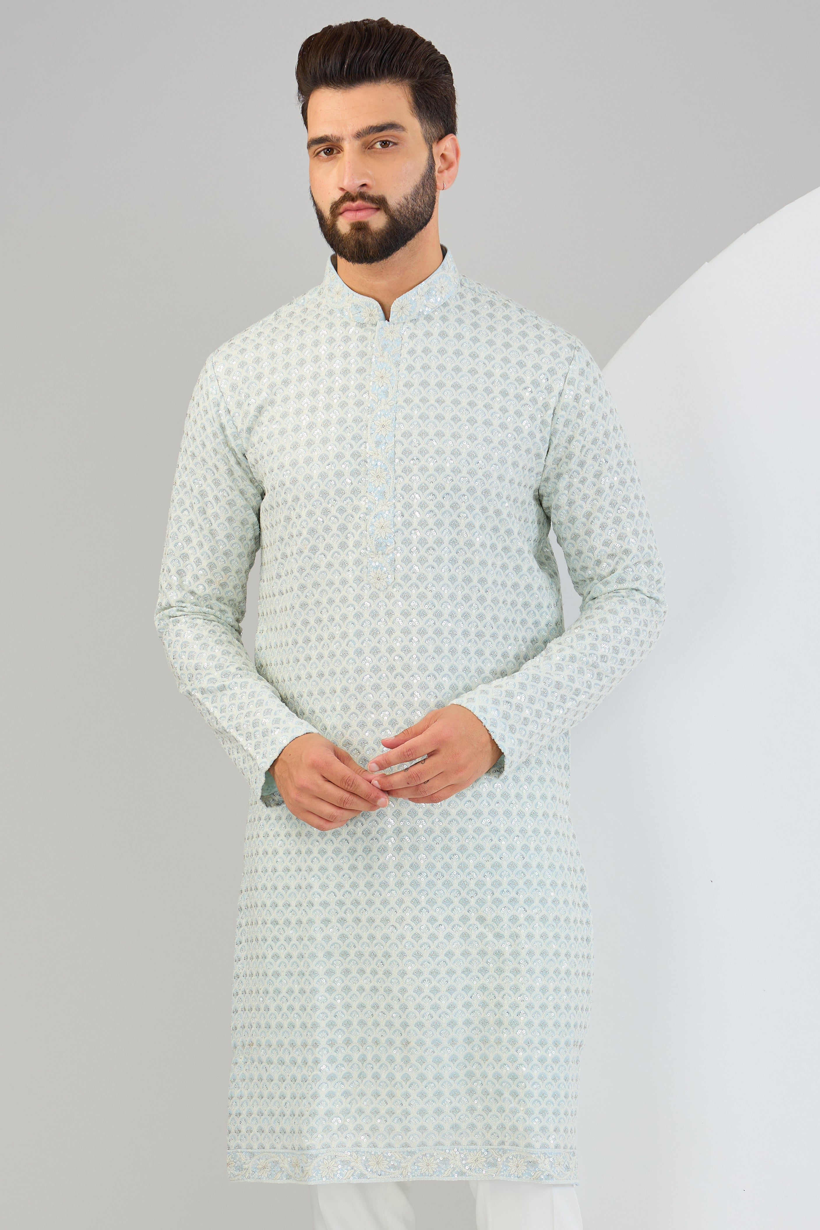 Powder blue chikankari kurta with heavy sequin work and intricate neckline. - kasbahmen