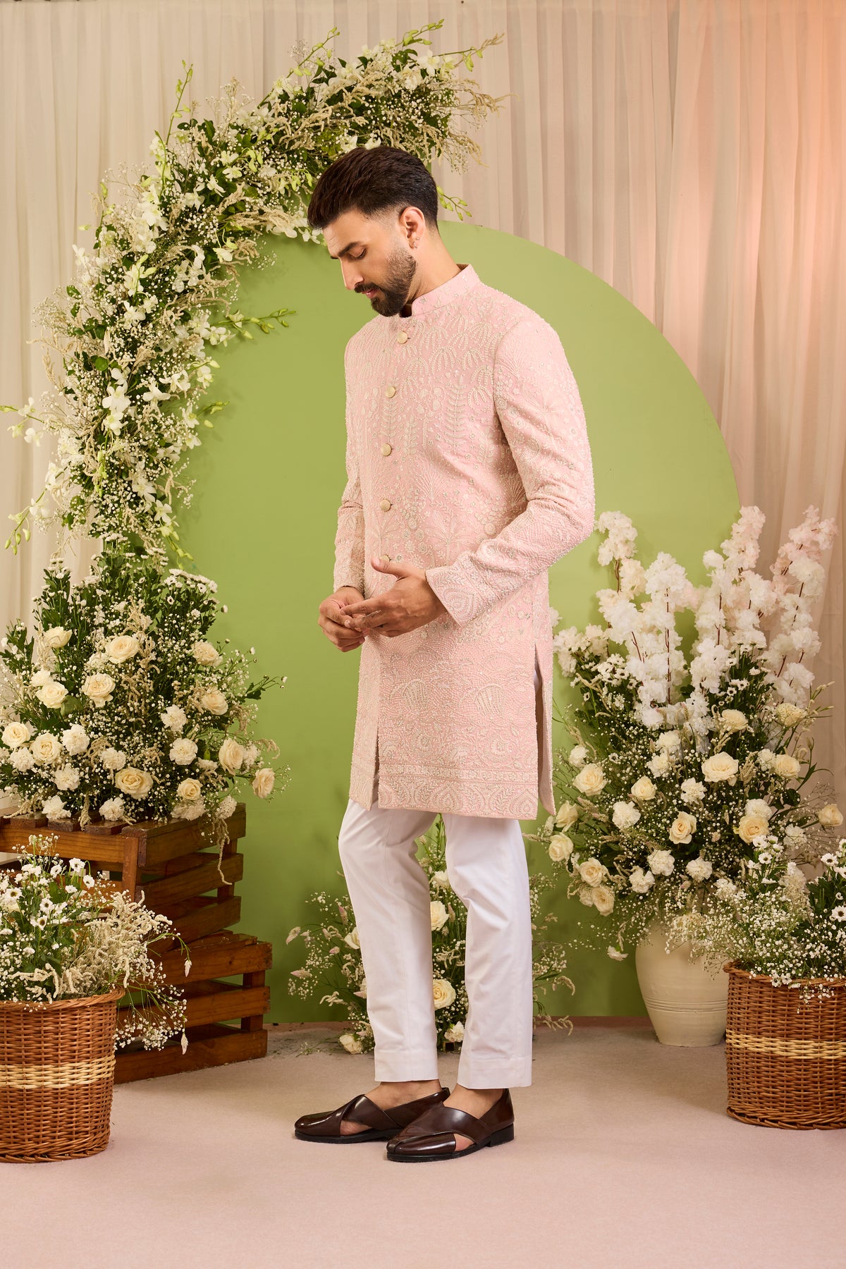 The Palais — A Pink Short Sherwani Richly Worked in Florals