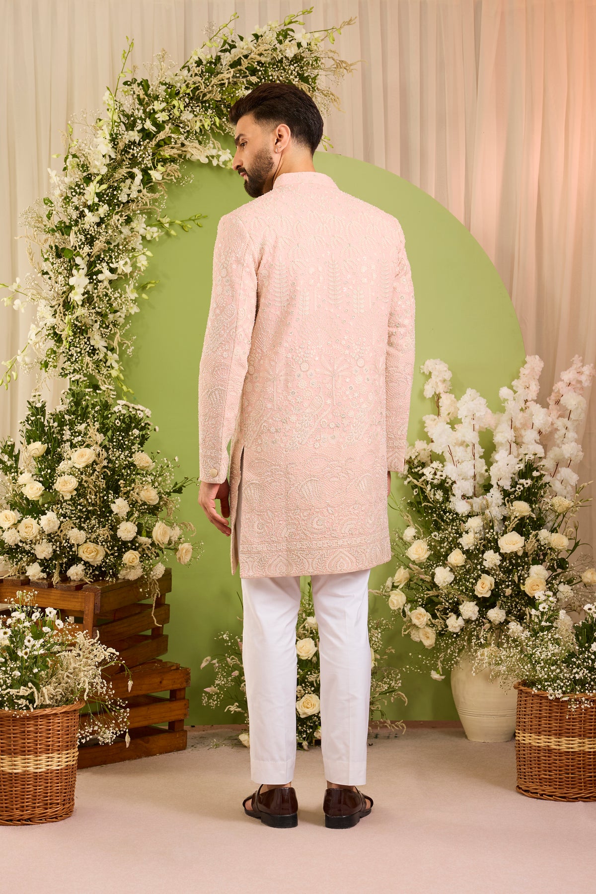 The Palais — A Pink Short Sherwani Richly Worked in Florals