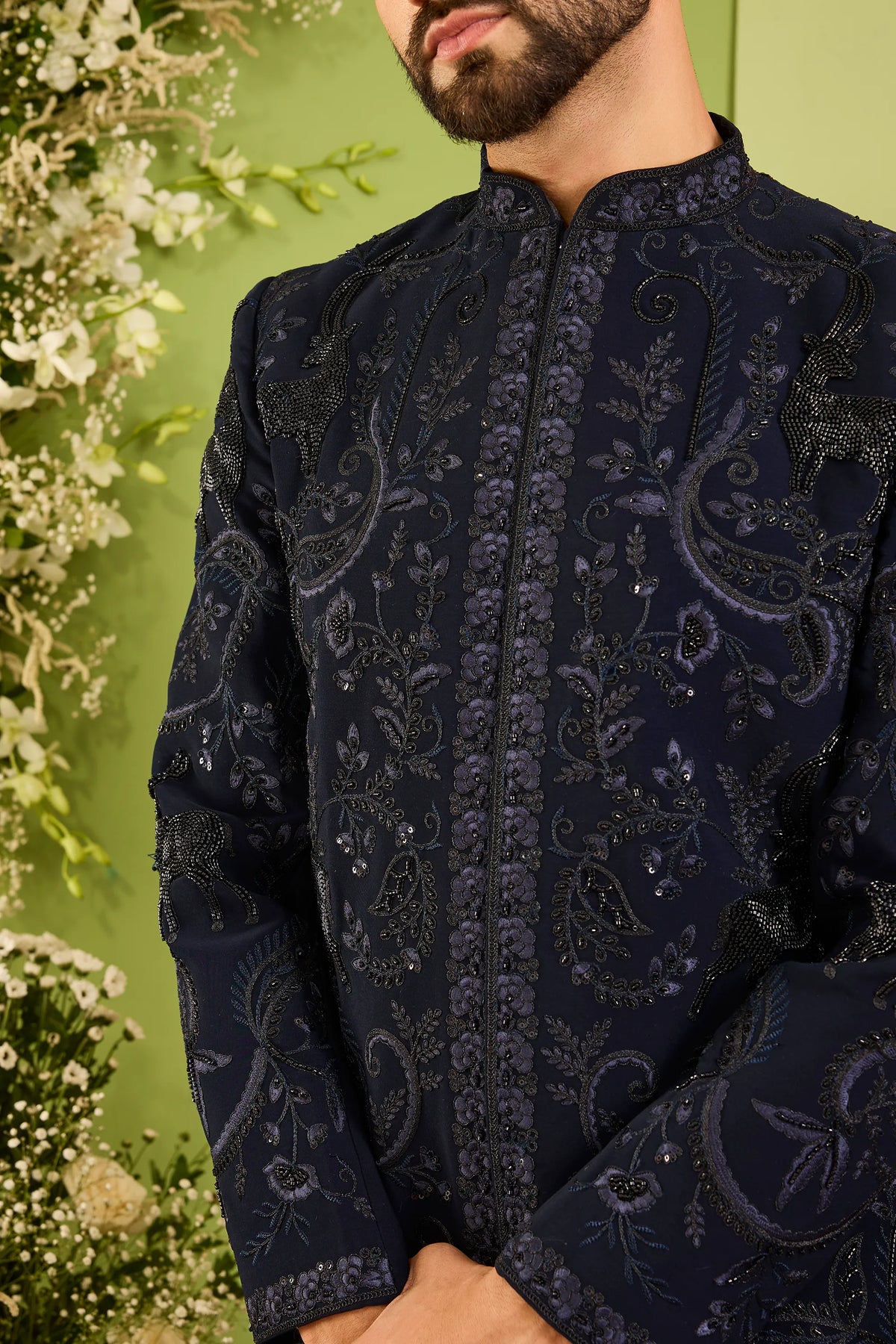 The Royal Crest - A Navy Sherwani Defined by Sculptural Deer Embroidery