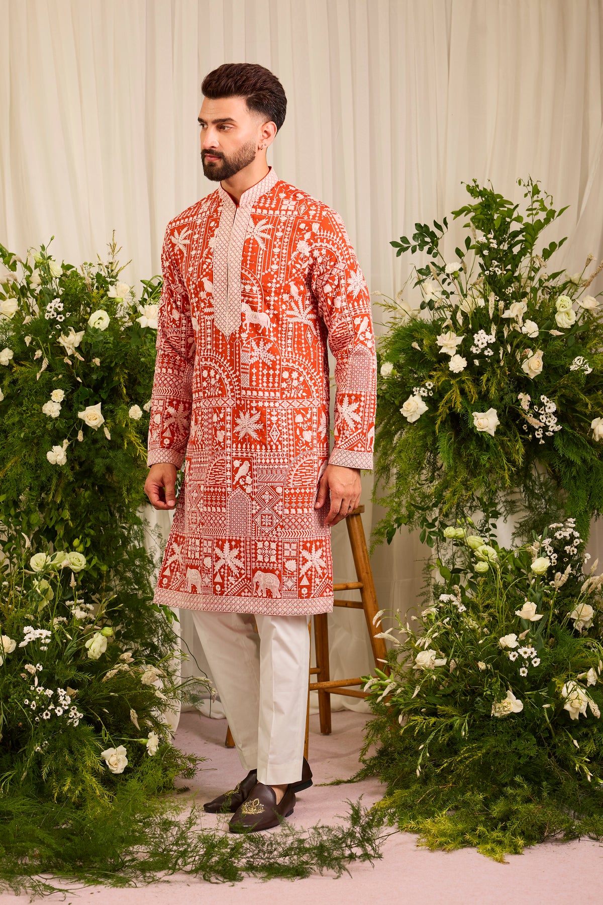 The Imperial — An orange Kurta Alive with Flora and Fauna