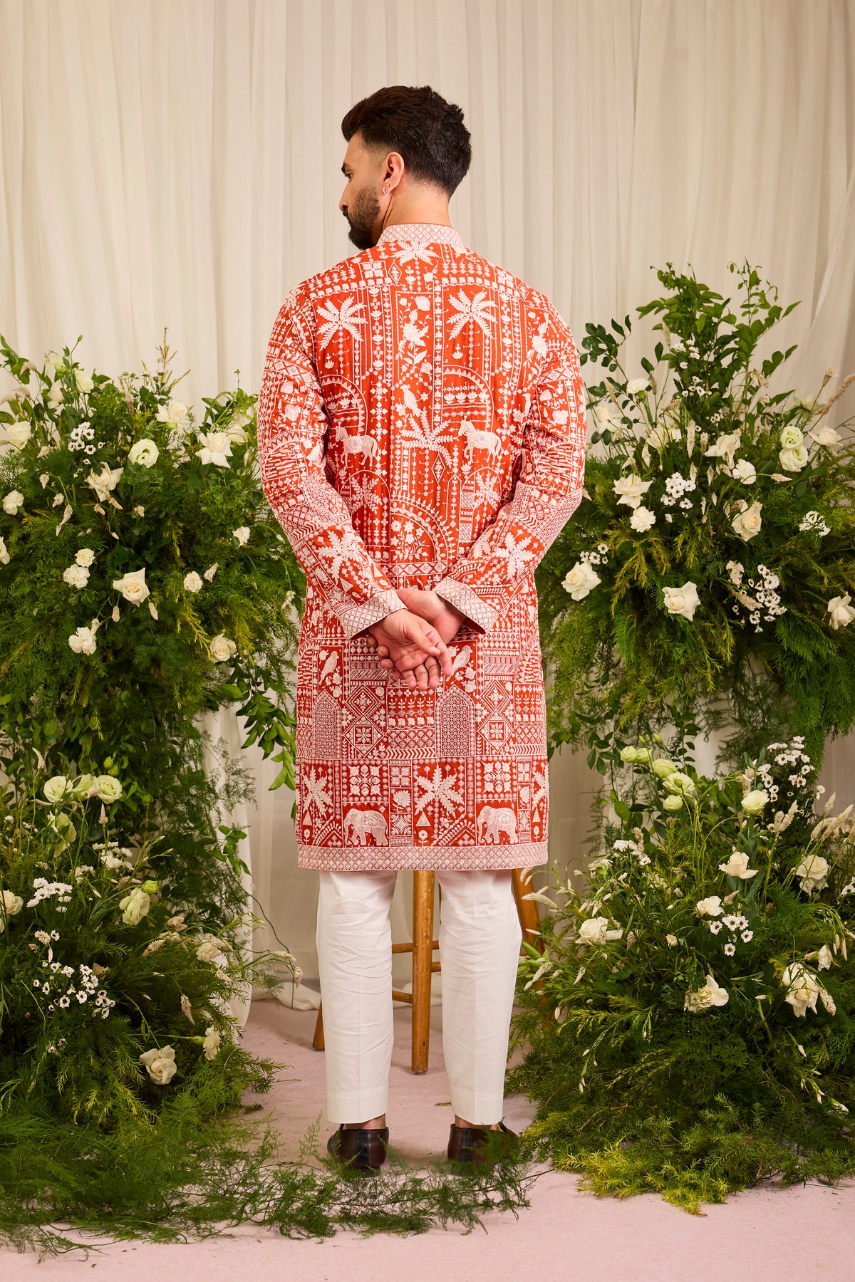 The Imperial — An orange Kurta Alive with Flora and Fauna
