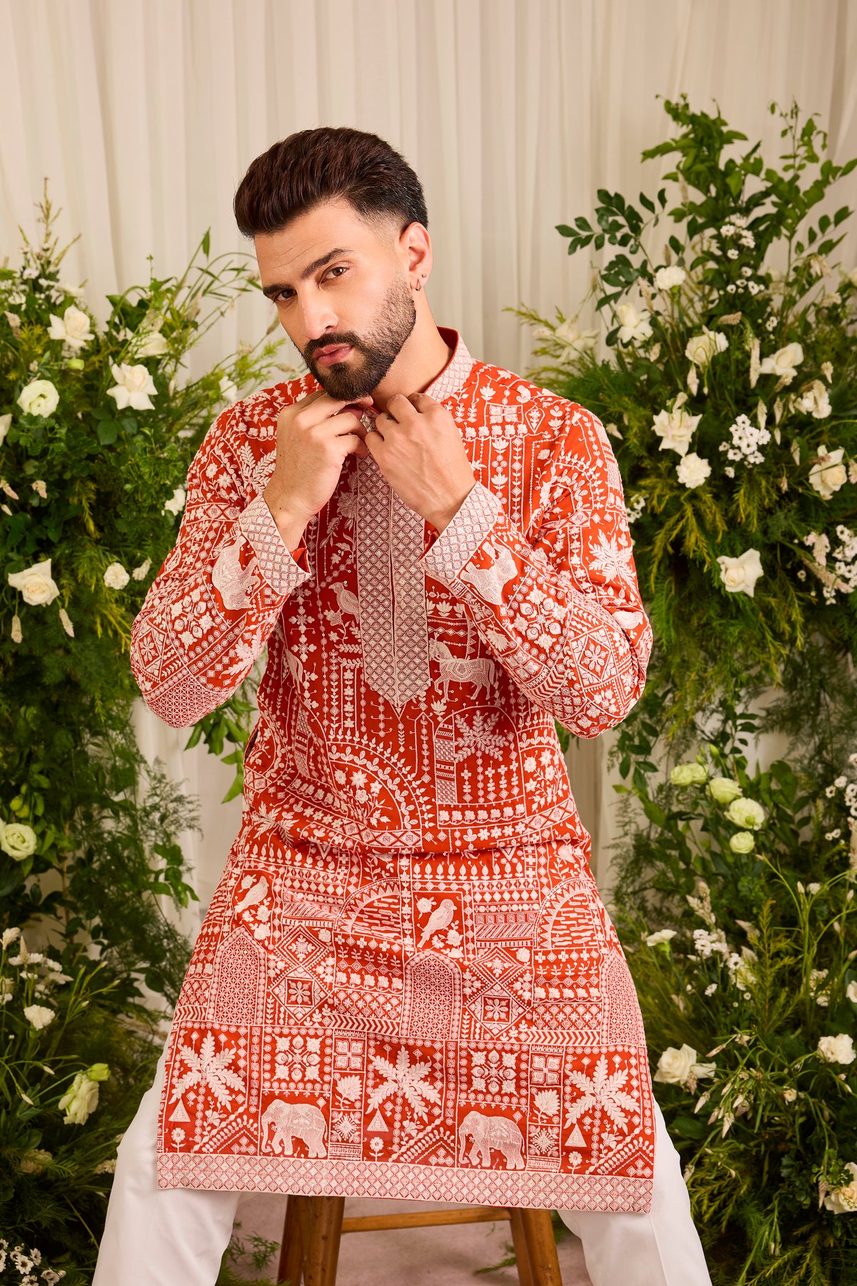 The Imperial — An orange Kurta Alive with Flora and Fauna
