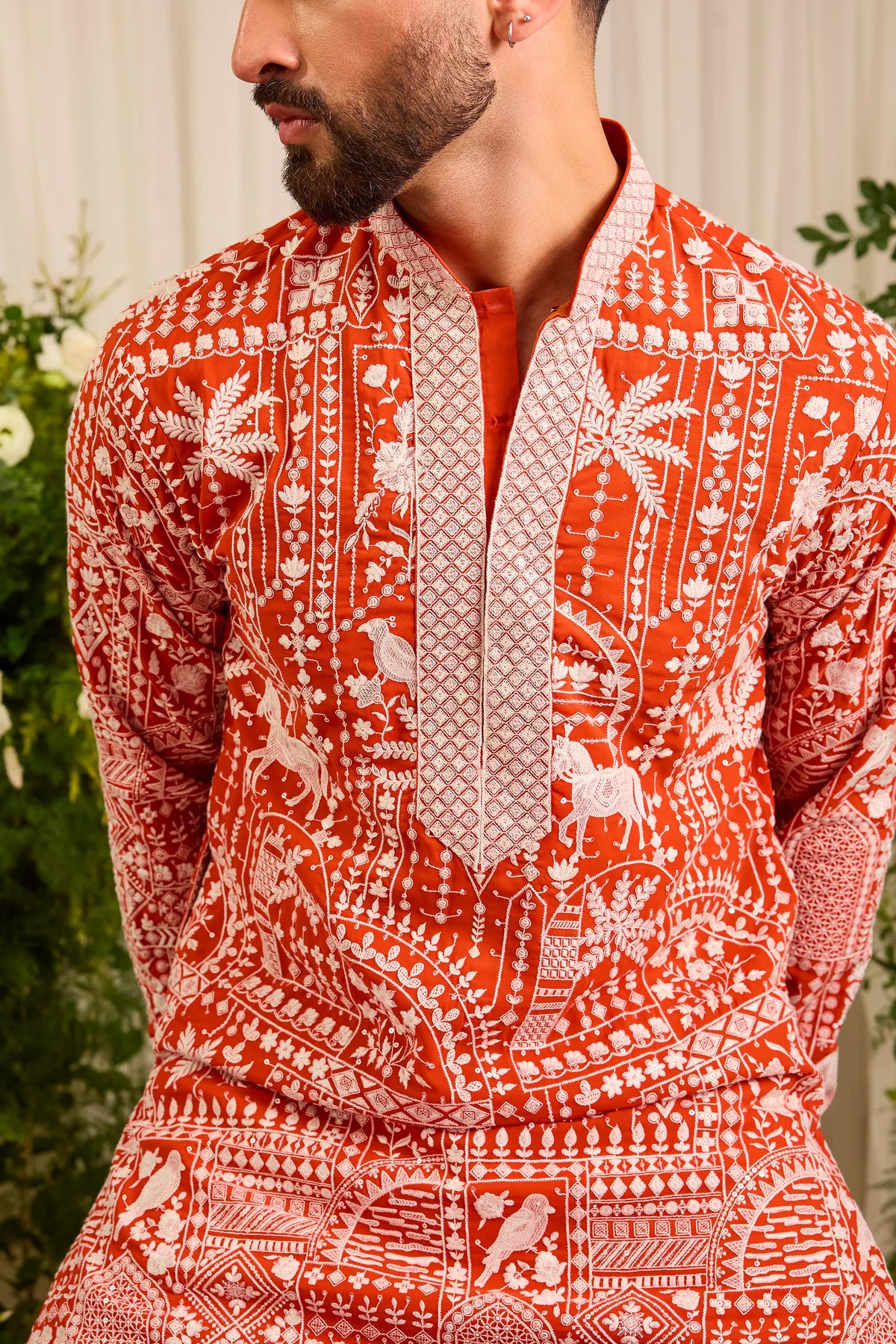 The Imperial — An orange Kurta Alive with Flora and Fauna
