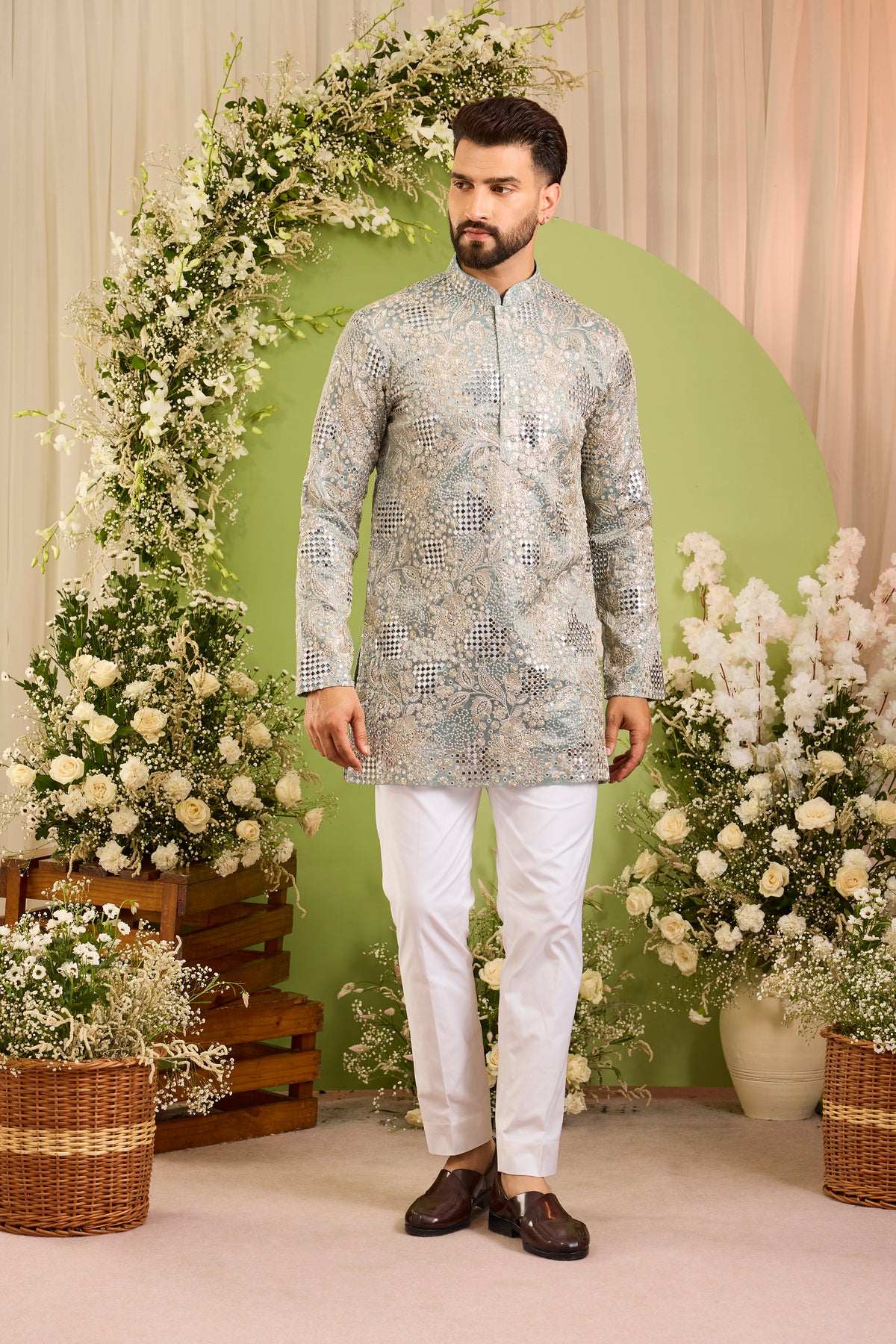 The iconic mirror work —  Blue mirror work Kurta Richly Embellished with Floral Detail