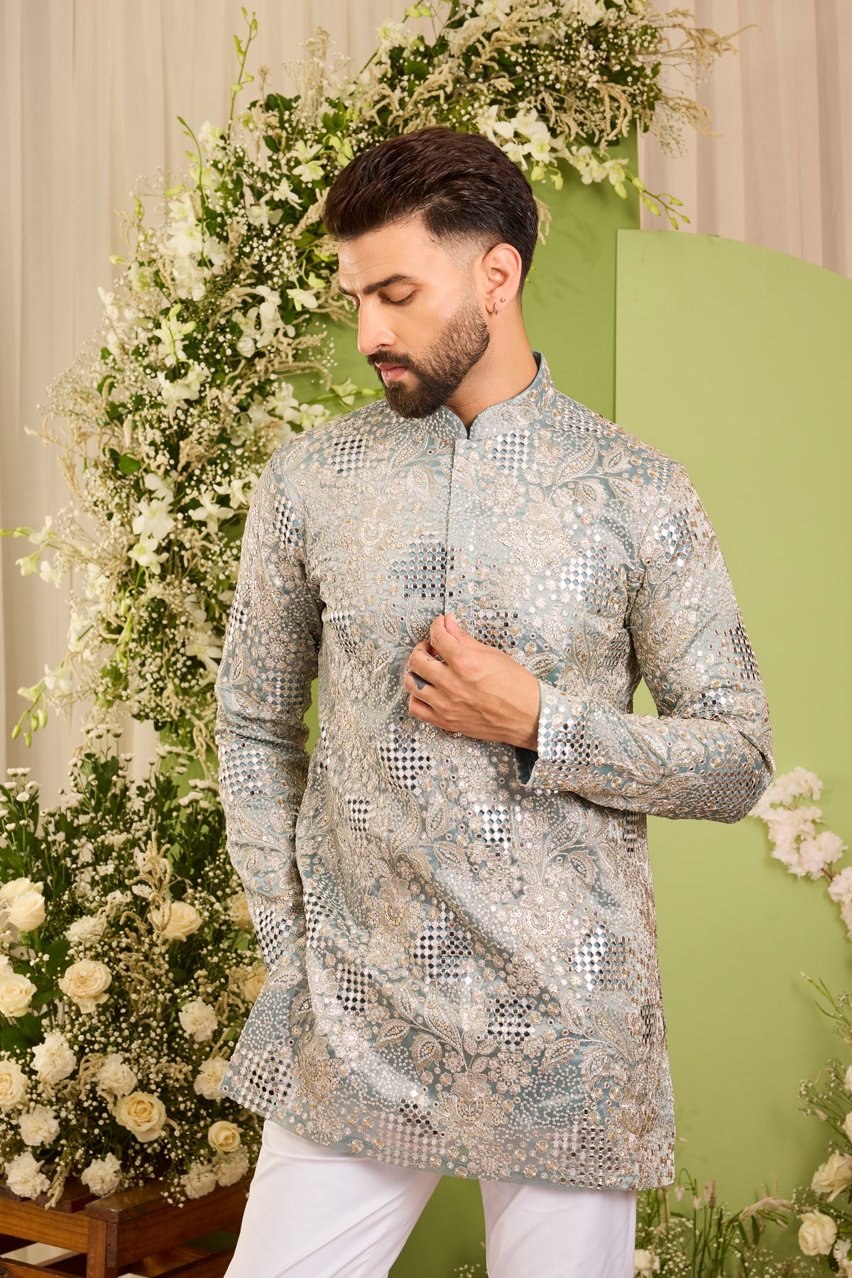 The iconic mirror work —  Blue mirror work Kurta Richly Embellished with Floral Detail