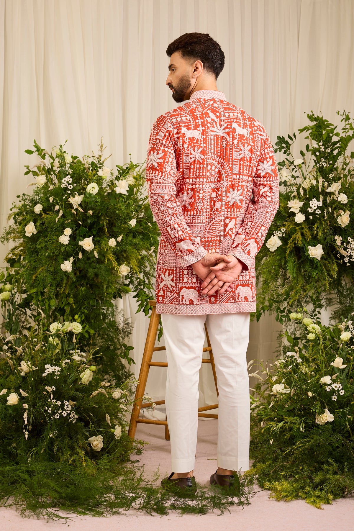 The Imperial — An orange short  Kurta Alive with Flora and Fauna