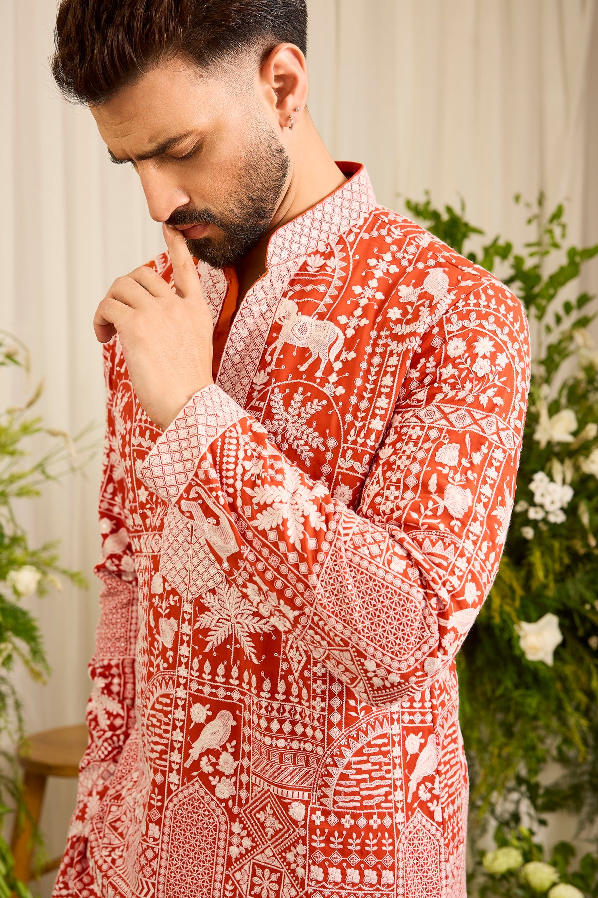 The Imperial — An orange short  Kurta Alive with Flora and Fauna