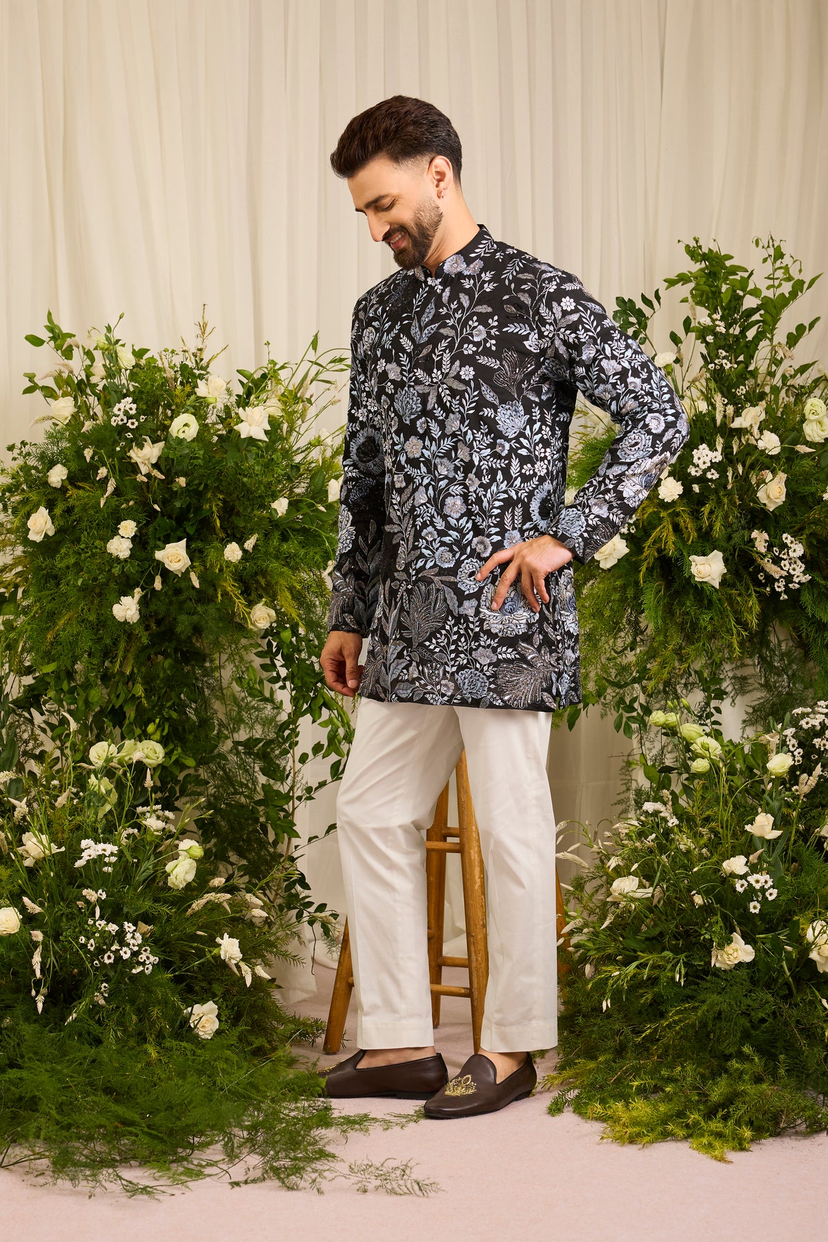The Calderon — A Black Kurta Draped in Intricate Floral Threadwork