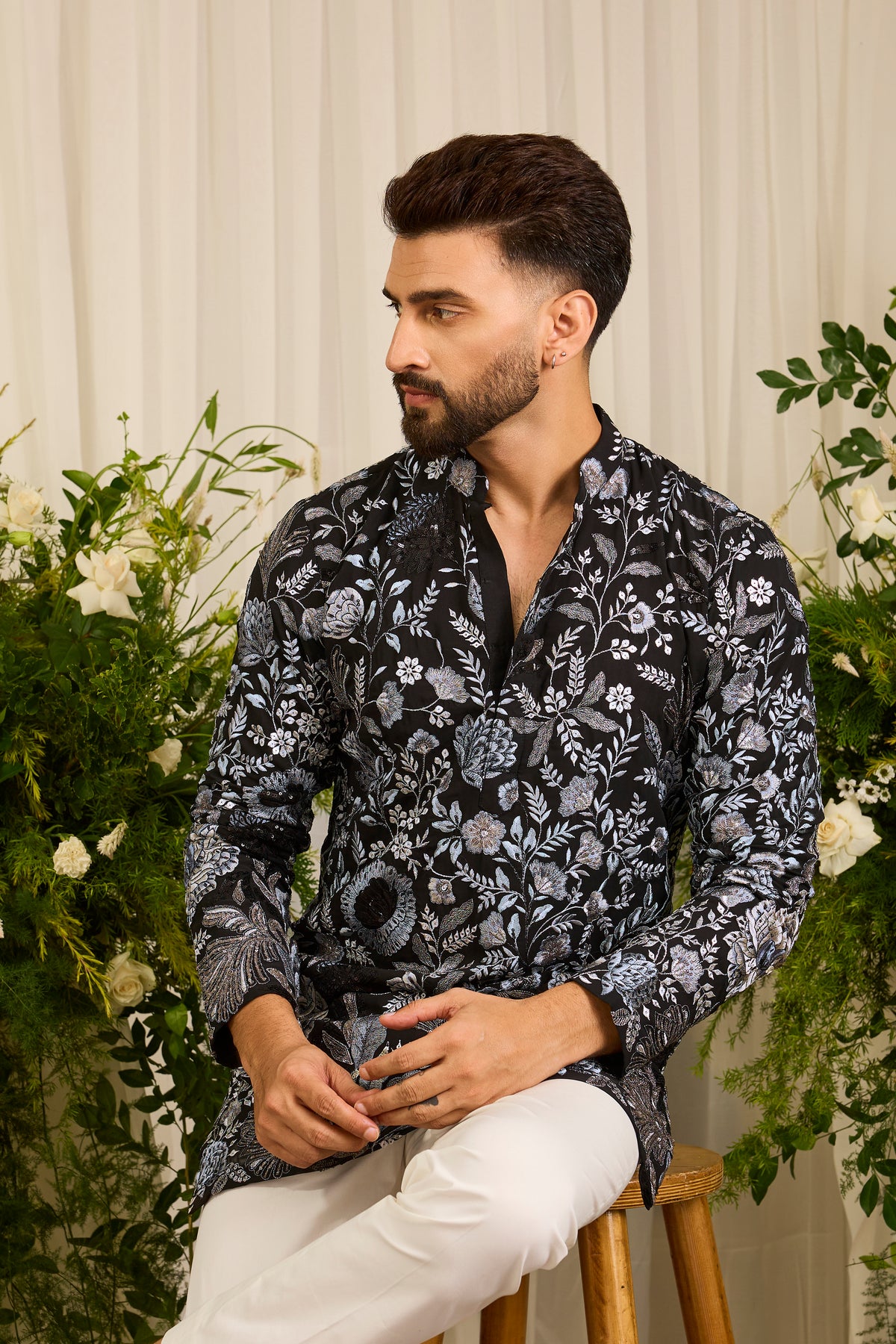 The Calderon — A Black Kurta Draped in Intricate Floral Threadwork