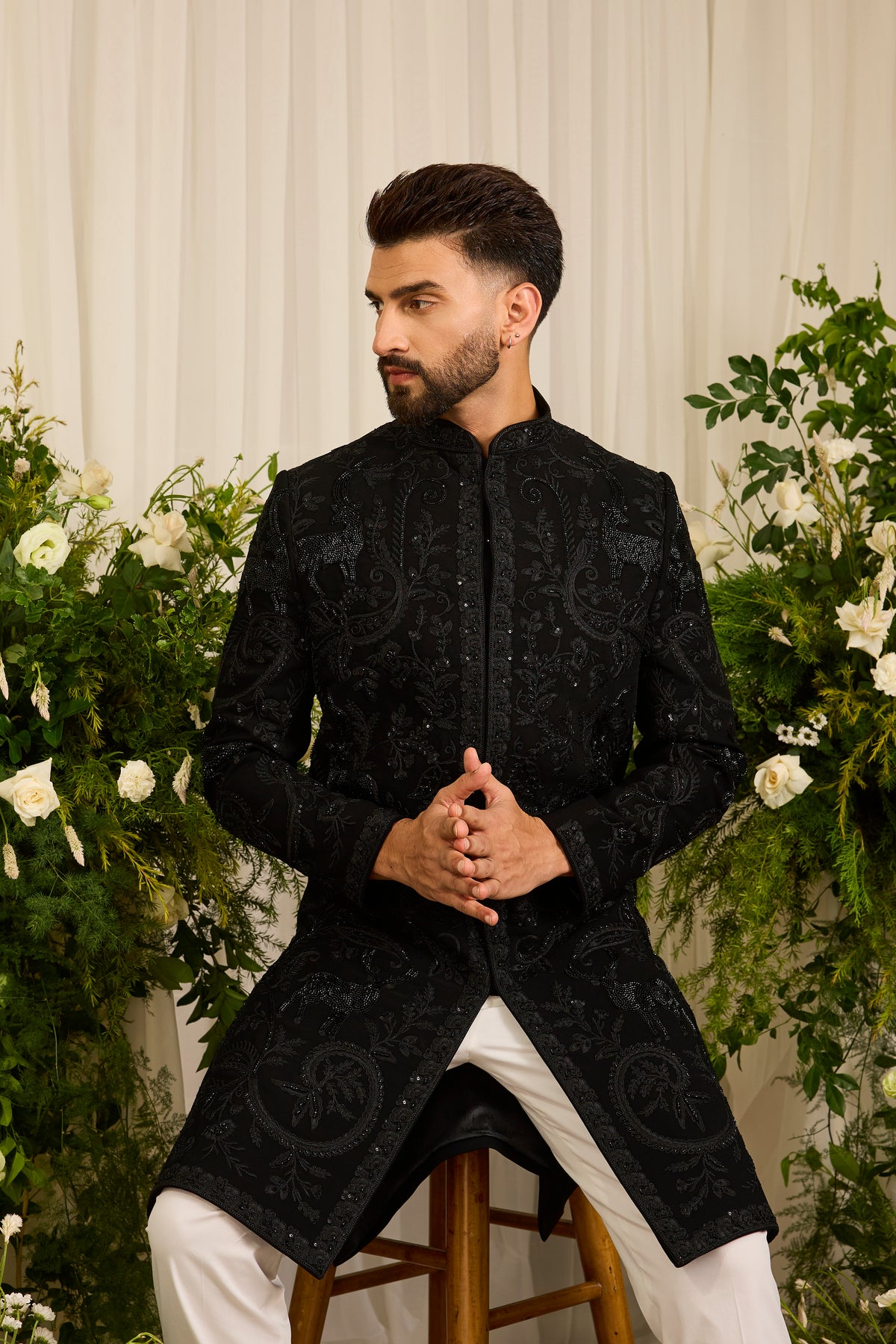 The Royal Crest - Black Sherwani Defined by Sculptural Deer Embroidery