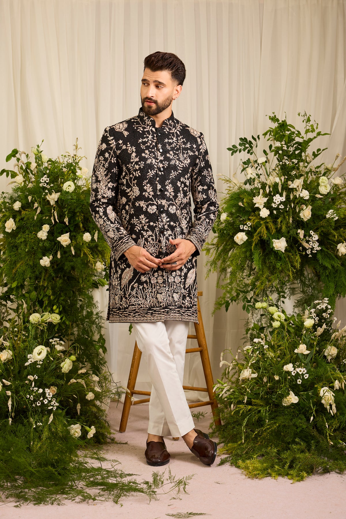 A Midnight Sequin short sherwani Embellished in Golden Threadwork and majestic flamingos
