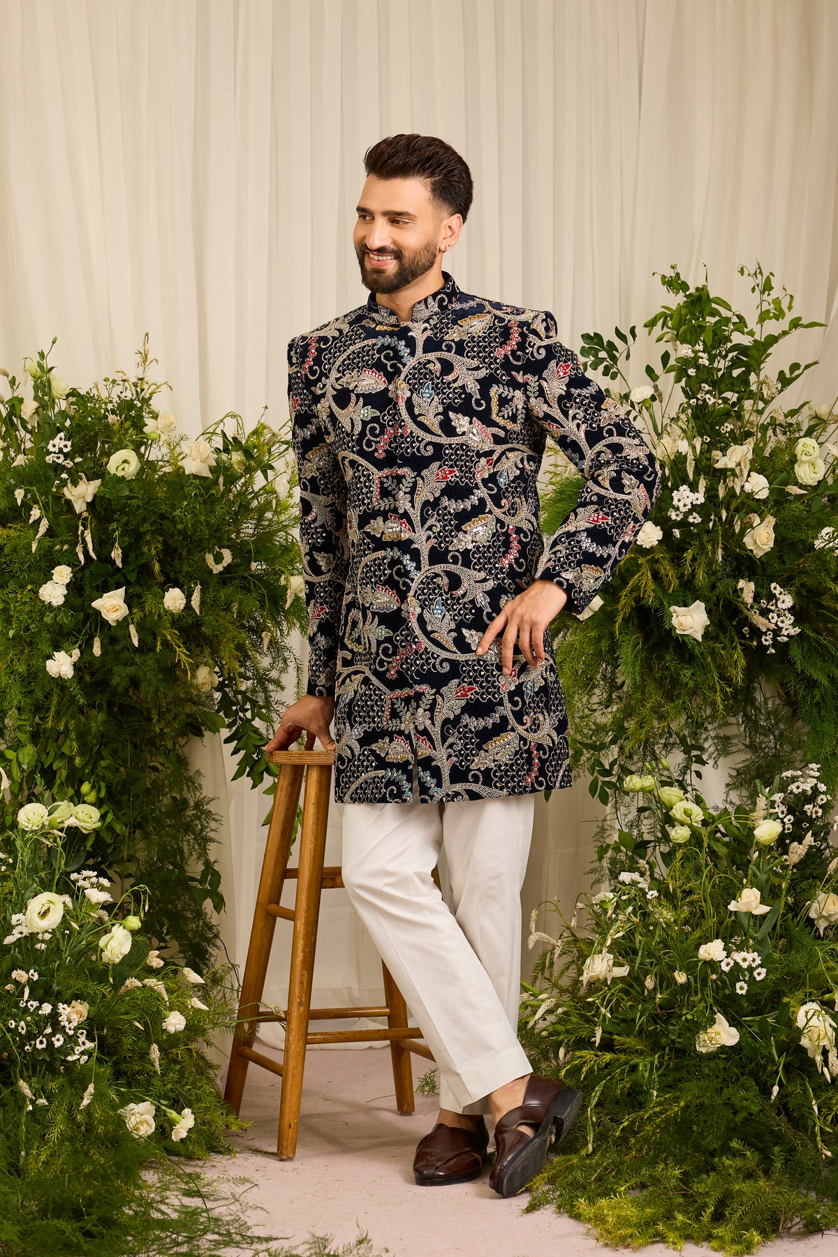 The Ducal Crown- A Navy short sherwani with Abstract Floral Handwork