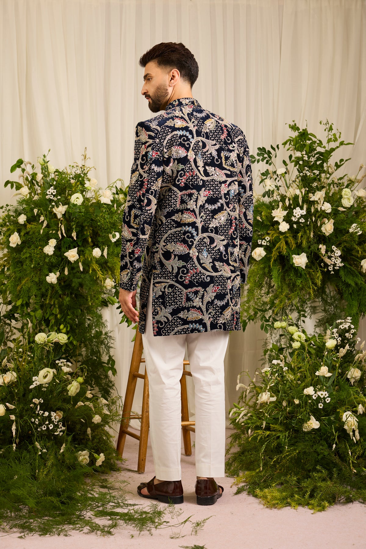 The Ducal Crown- A Navy short sherwani with Abstract Floral Handwork