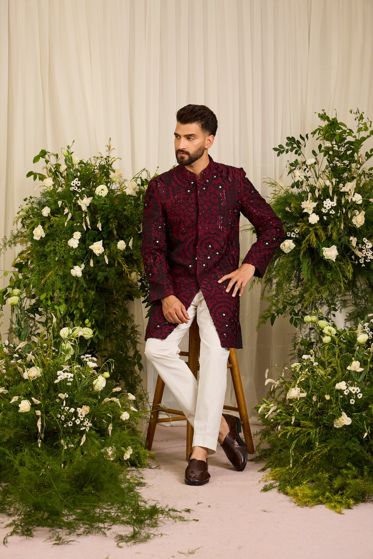 The Lannister - A Maroon Sherwani with Sculptural Black Embellishment