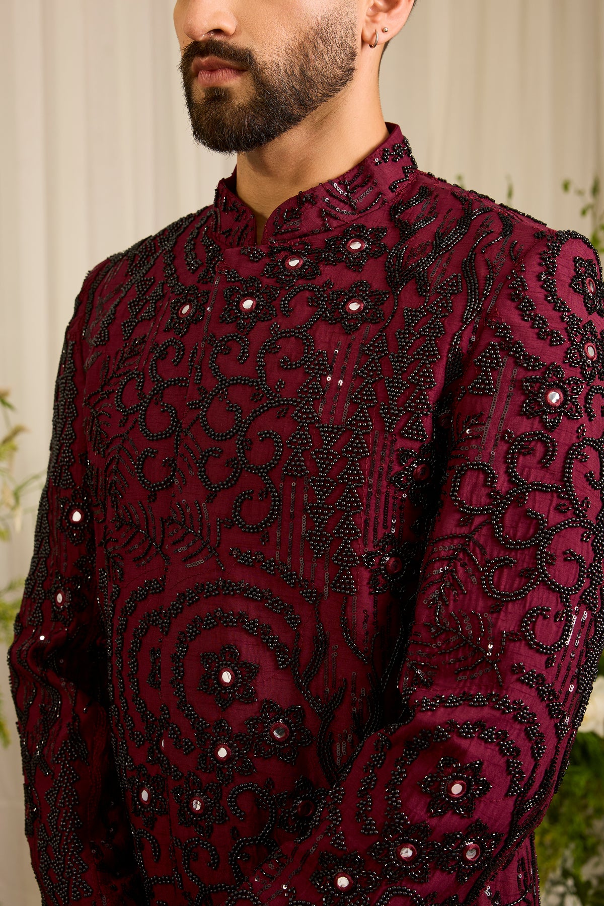 The Lannister - A Maroon Sherwani with Sculptural Black Embellishment