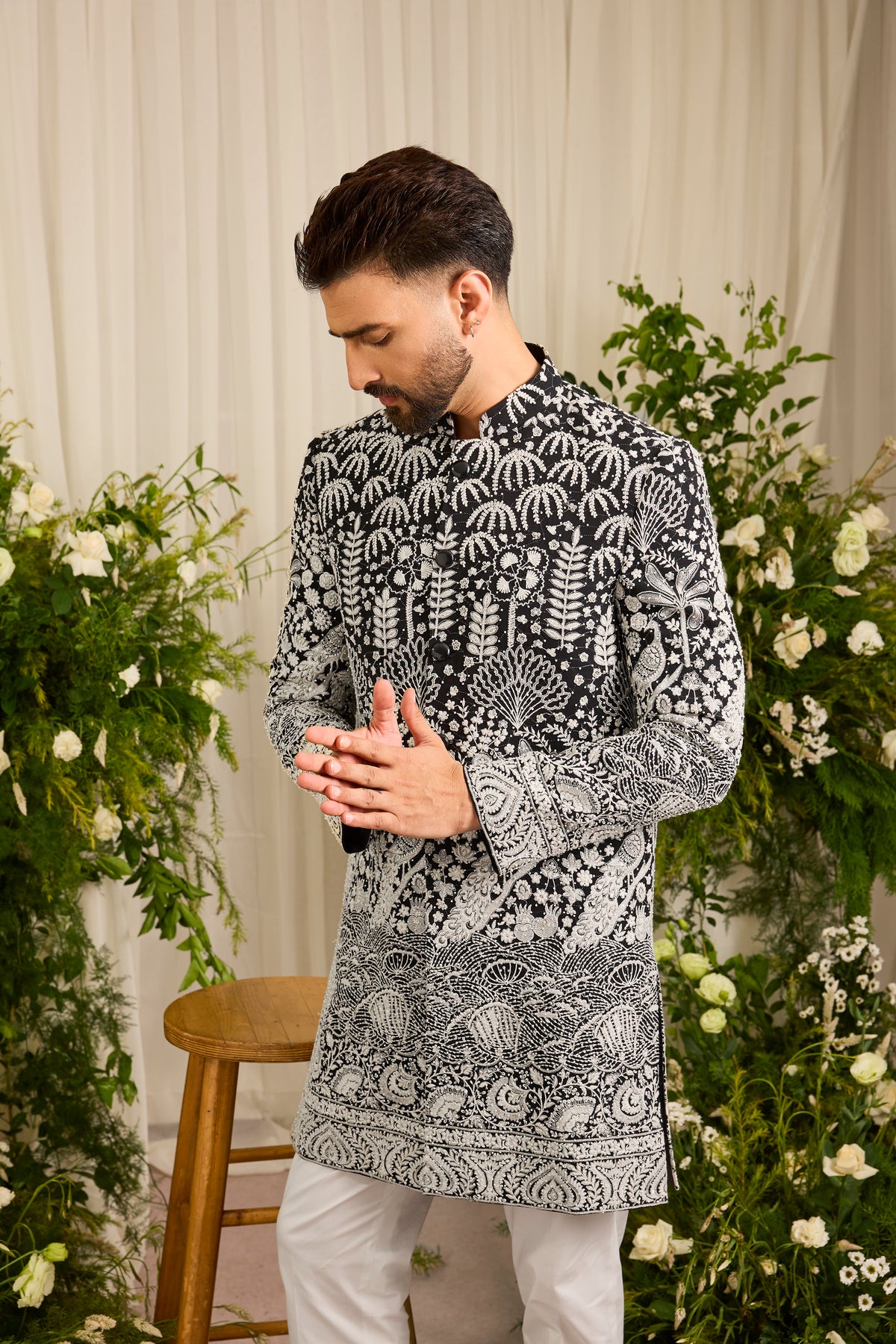The Palais — A black Short Sherwani Richly Worked in Florals