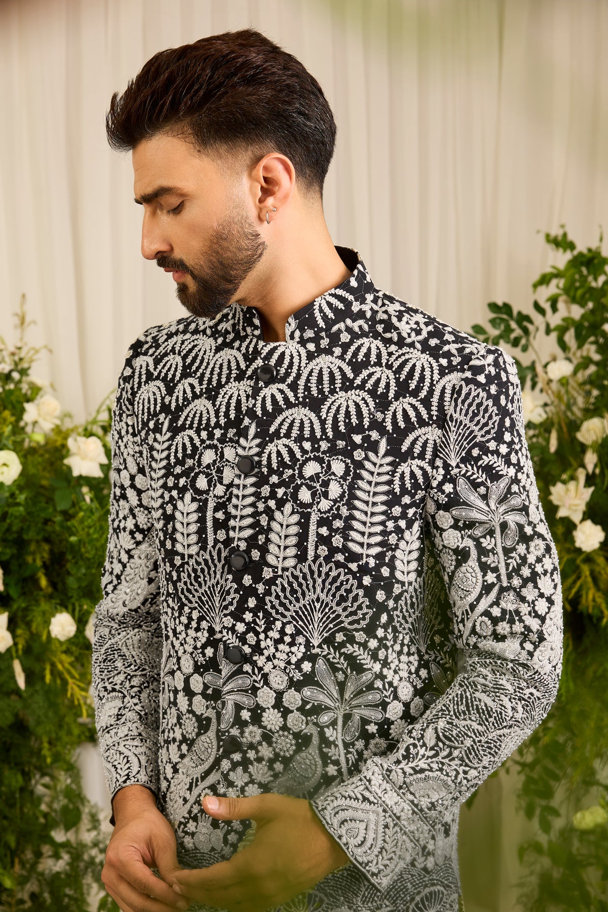 The Palais — A black Short Sherwani Richly Worked in Florals