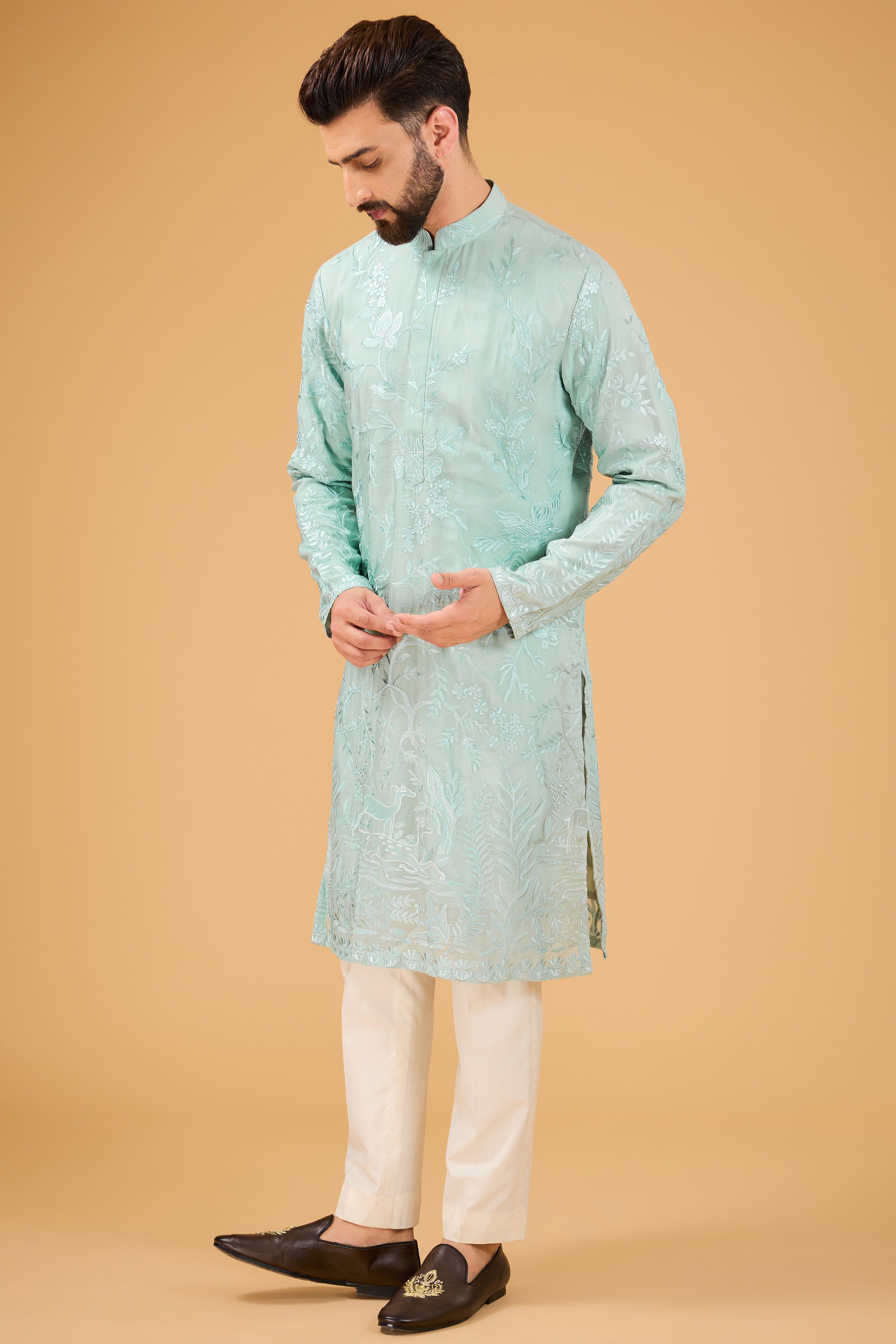 Blue thread-work kurta with detailed flora and fauna motifs. - kasbahmen