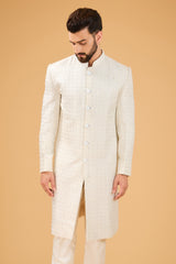 Ivory Sherwani featuring exquisite cut dana work