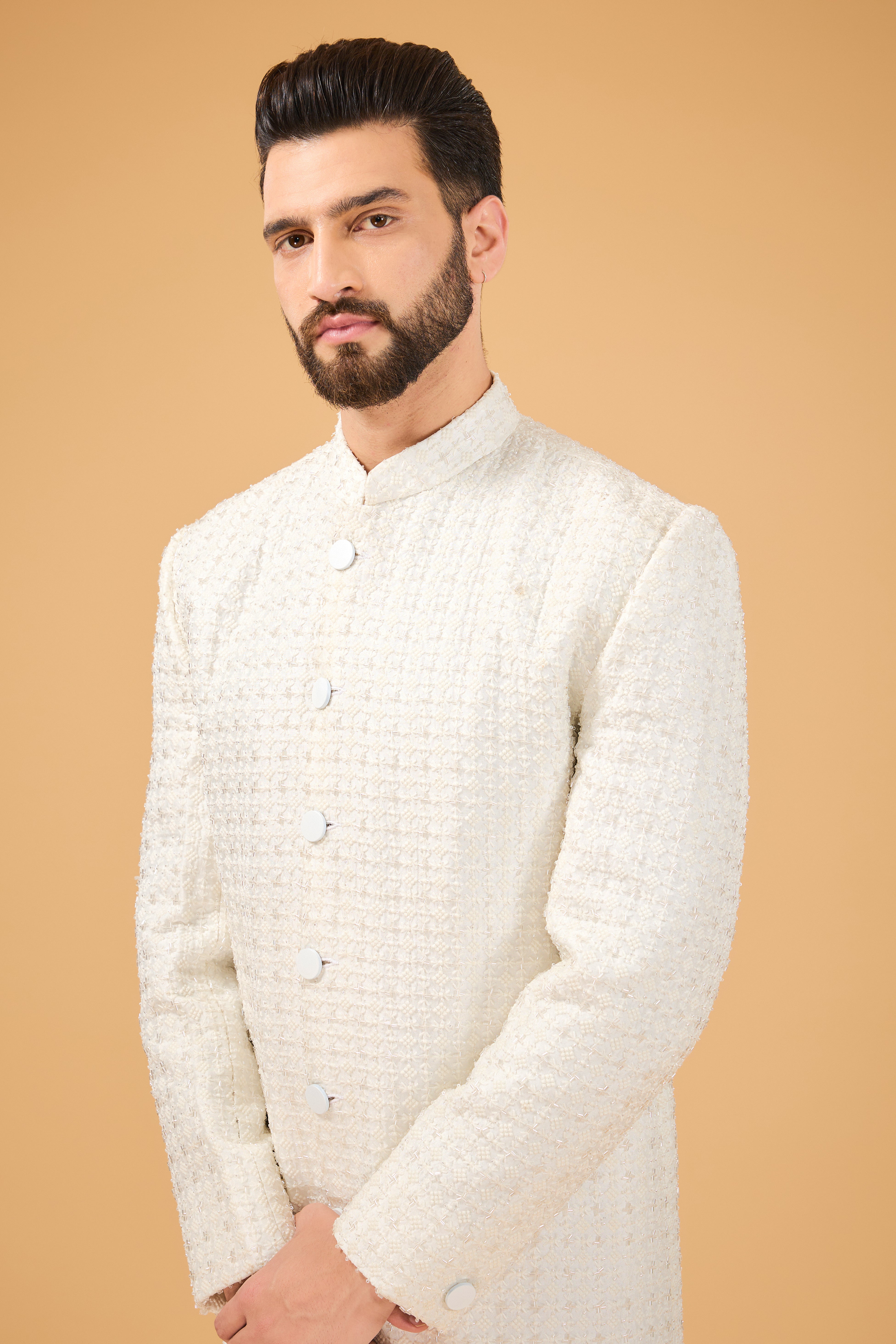 Ivory Sherwani featuring exquisite cut dana work - kasbahmen