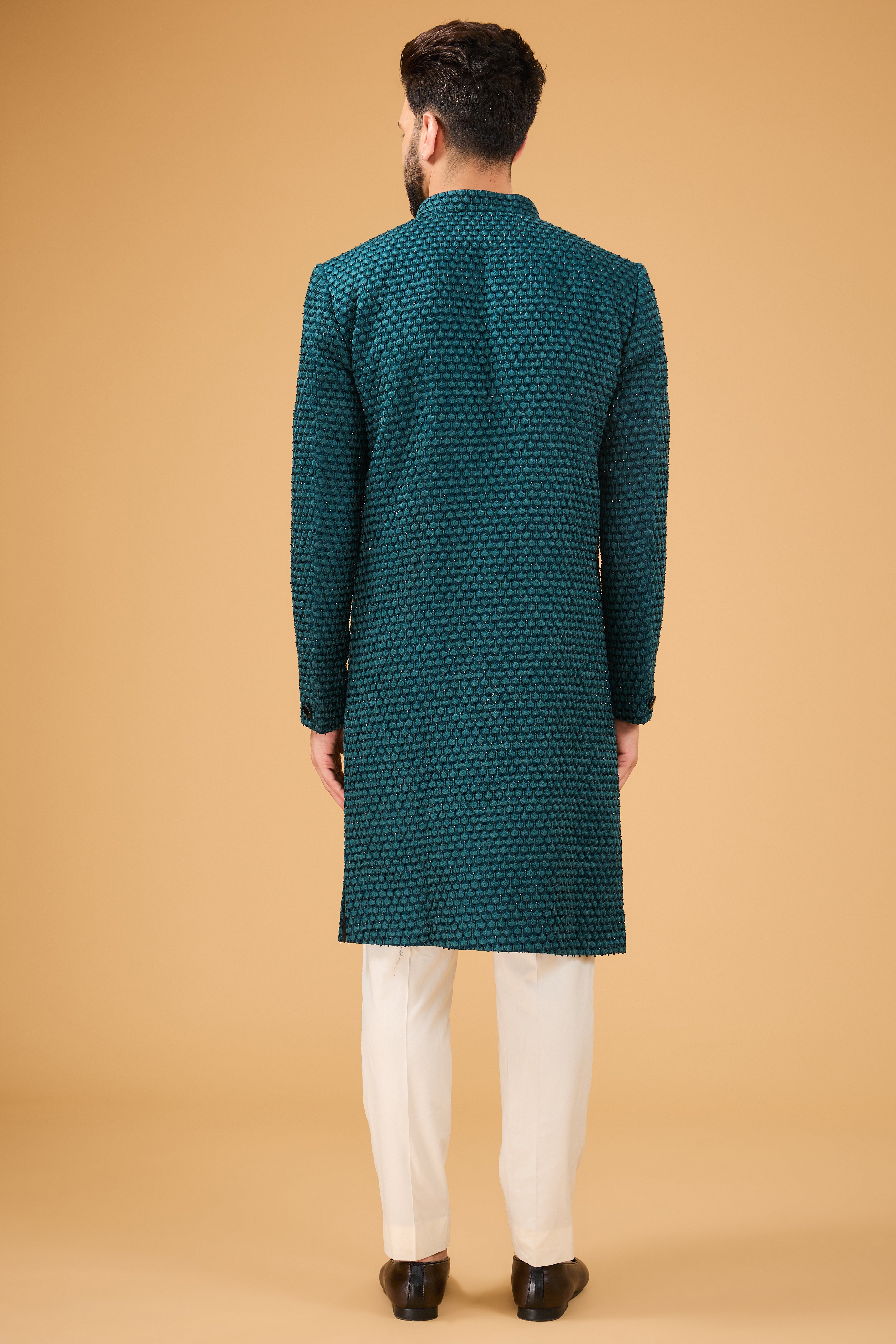 Teal Sherwani featuring exquisite cut dana work - kasbahmen