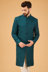 Teal Sherwani featuring exquisite cut dana work - kasbahmen