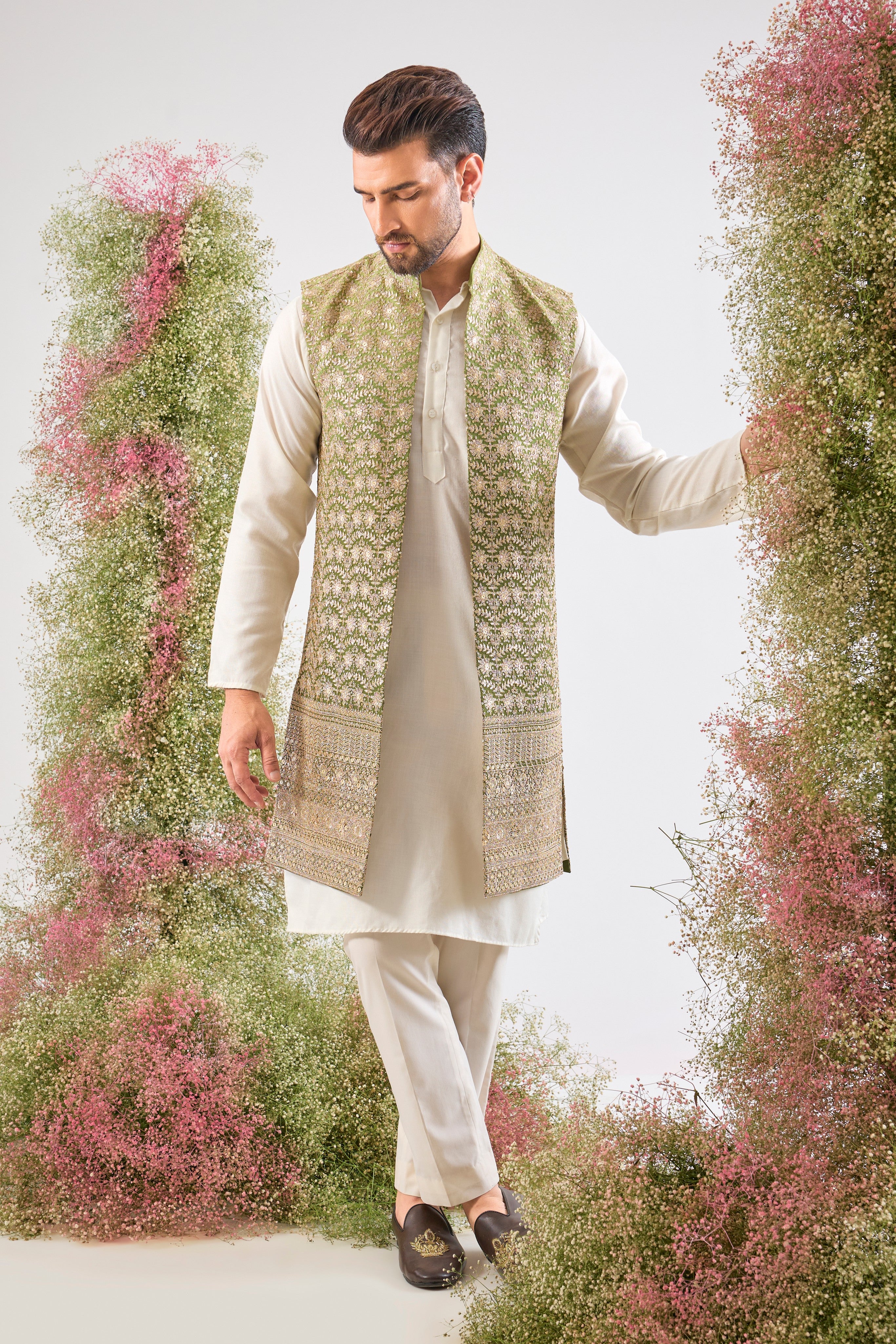 The ultimate gradient goal. 🤩 Our Green Ombre Long Open Jacket is dressed in breathtaking, Detailed Zari and Sequin Work. A majestic piece for your festive collection! 💚