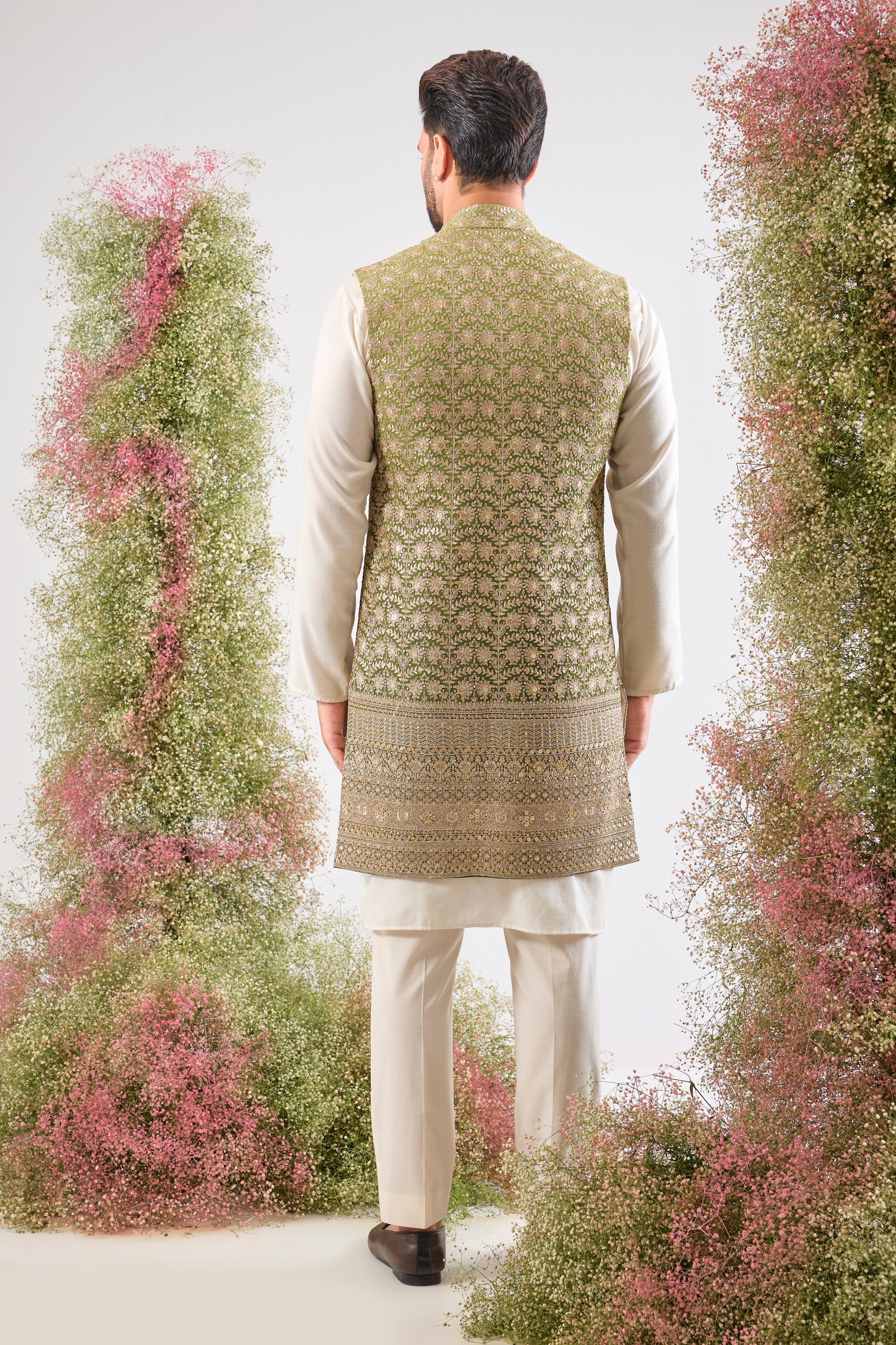 The ultimate gradient goal. 🤩 Our Green Ombre Long Open Jacket is dressed in breathtaking, Detailed Zari and Sequin Work. A majestic piece for your festive collection! 💚