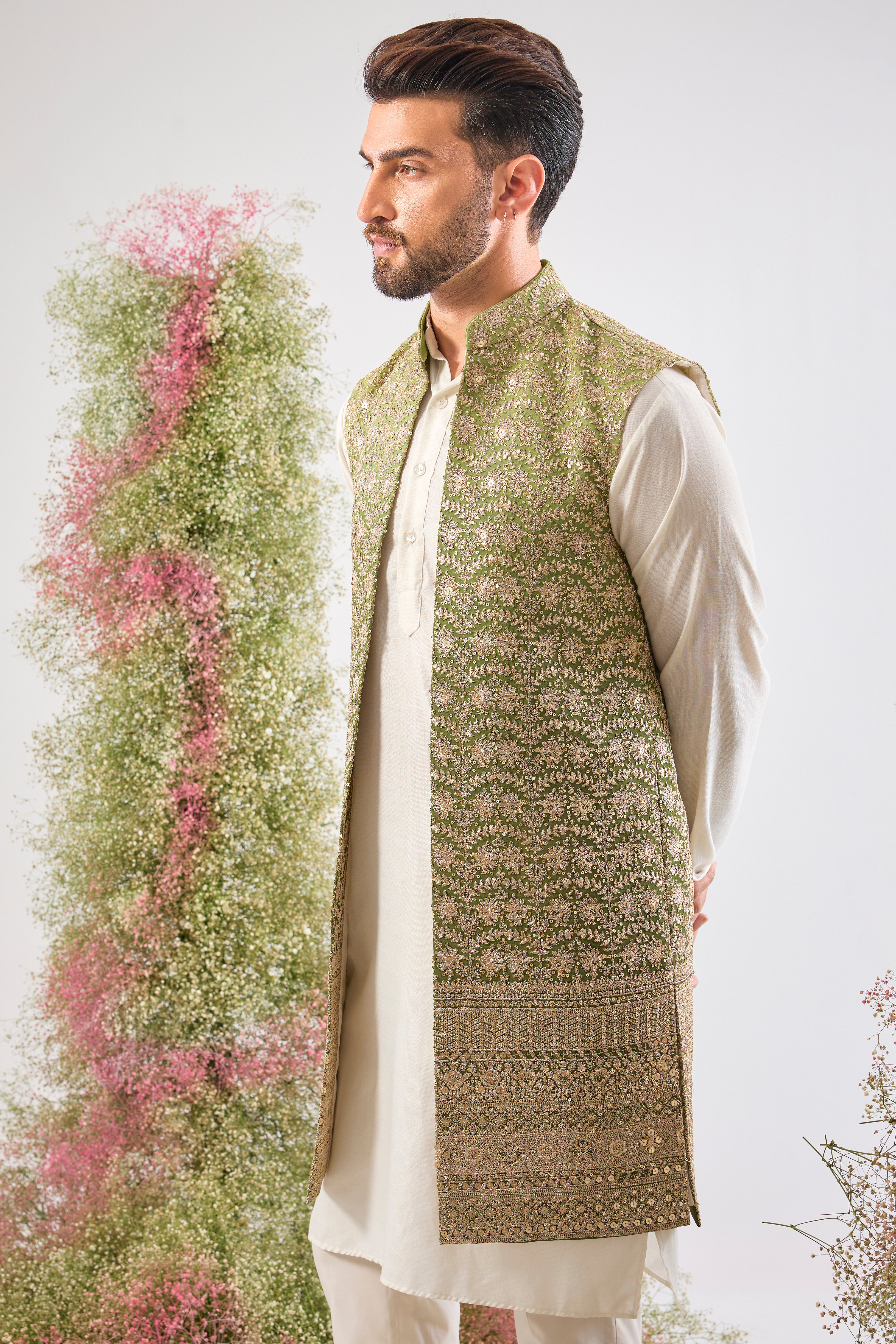 The ultimate gradient goal. 🤩 Our Green Ombre Long Open Jacket is dressed in breathtaking, Detailed Zari and Sequin Work. A majestic piece for your festive collection! 💚