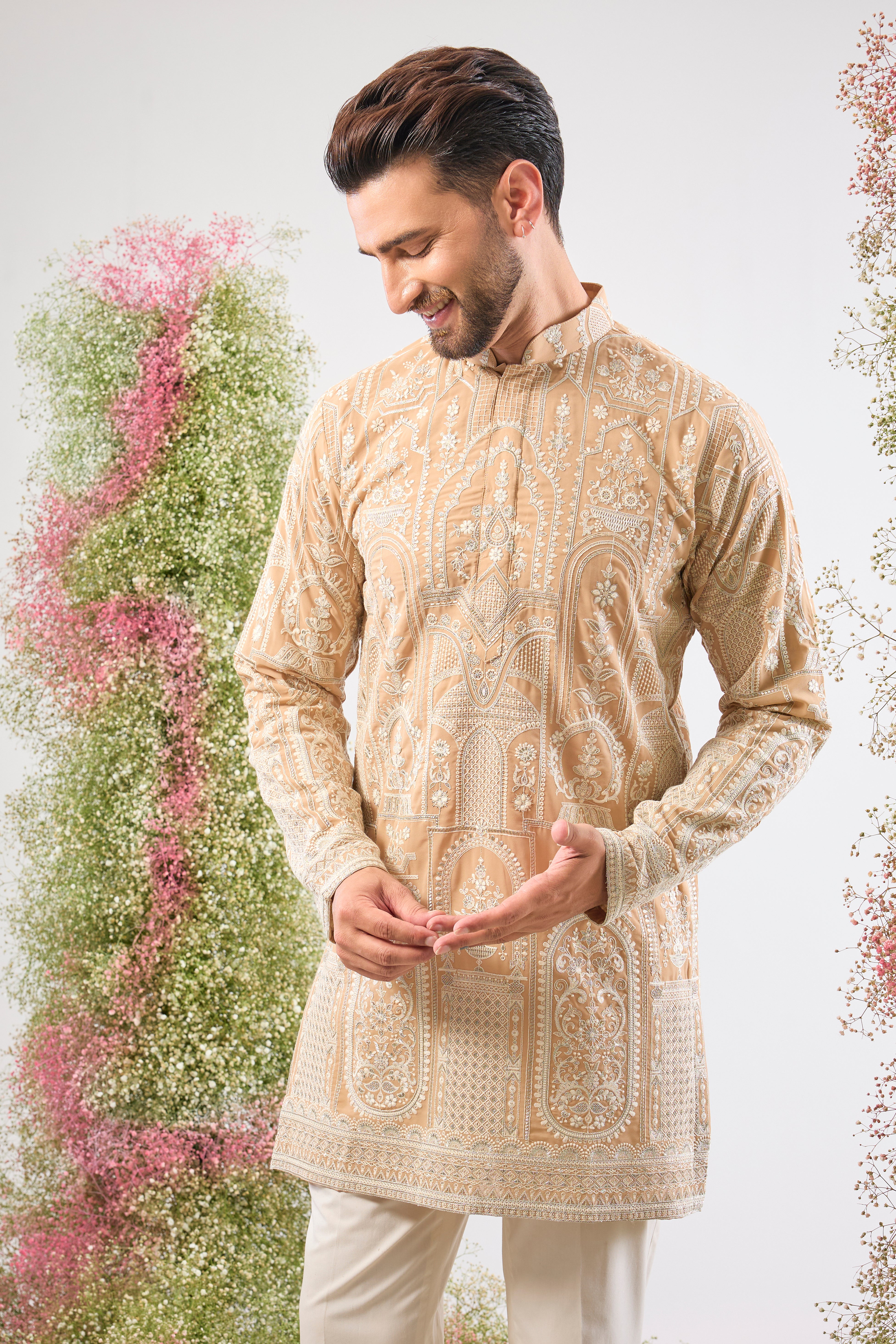 Our Mouse (Beige) Short Kurta offers a refined base for the beautiful texture of Intricate White Kashmiri Thread Work. The monochromatic palette is pure class and highlights the detailed craftsmanship perfectly. 🕊️