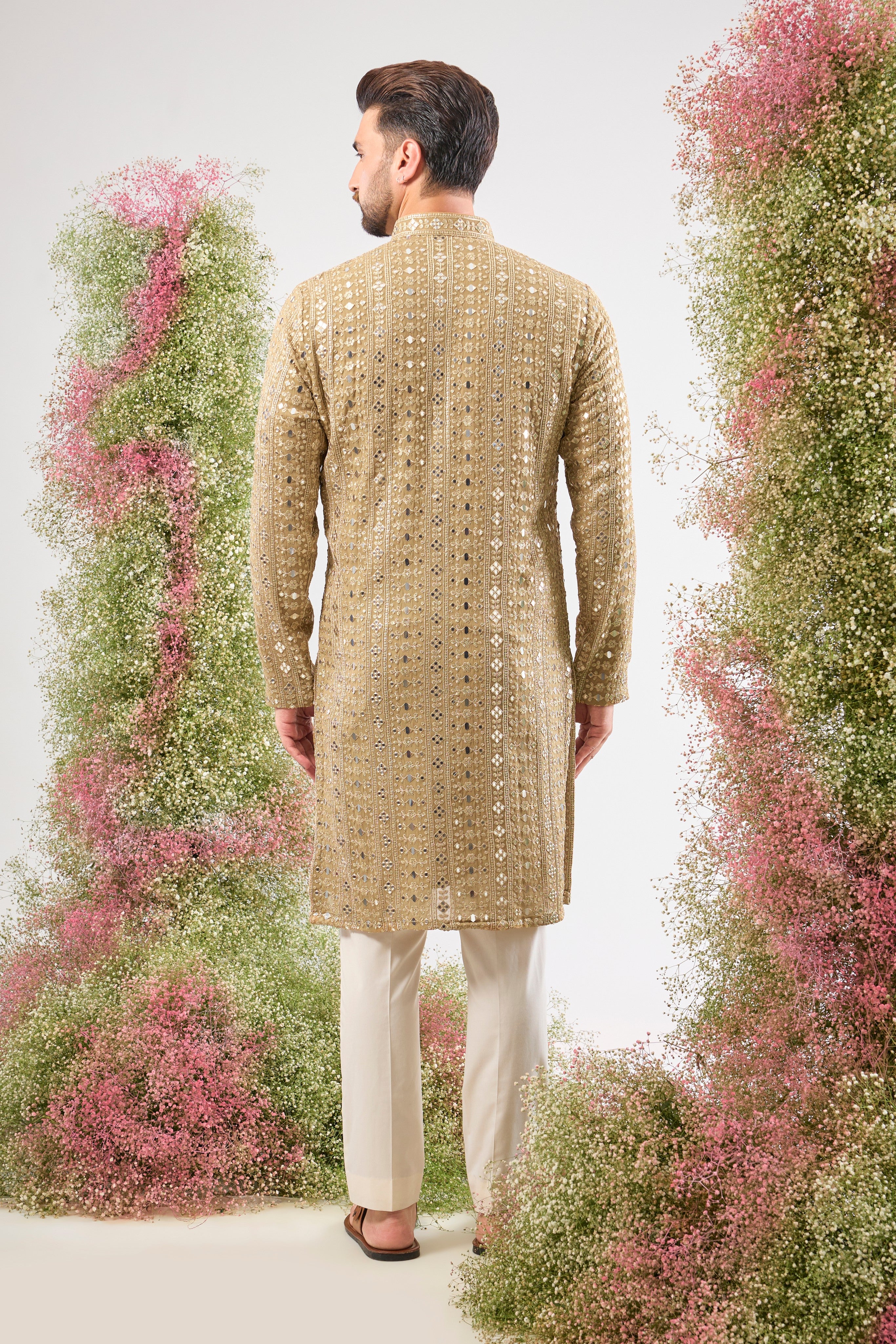 Dazzling Copper. Maximum shine. Our Kurta features Heavy Sequin Work that mimics a mirror shine, complemented by Intricate Thread Work. You'll steal the show! 💫