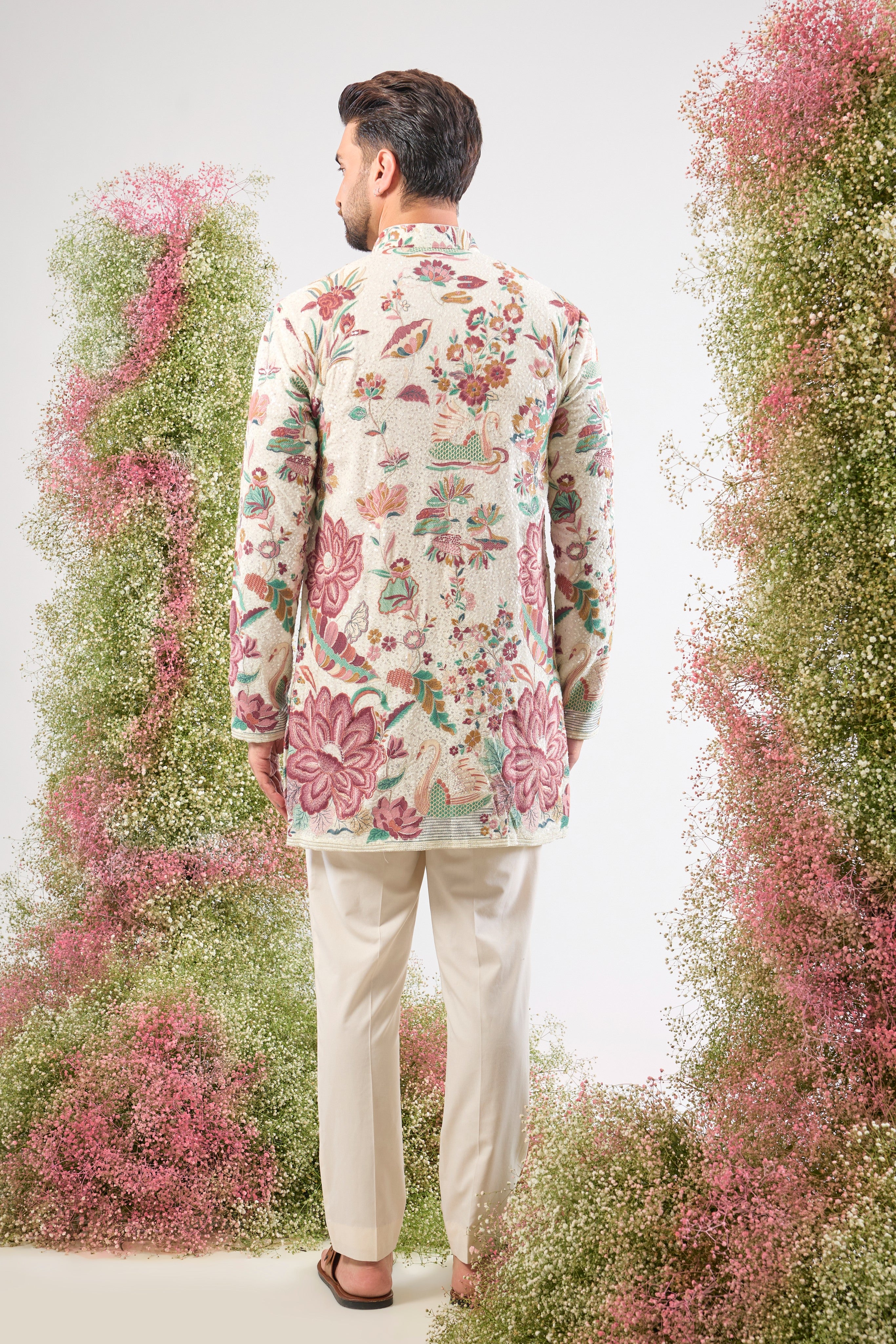 Ethereal White. Charming details. Our Sequined Kurta features beautiful Flamingos and Lotus motifs—a truly exquisite look. 🤍🦩