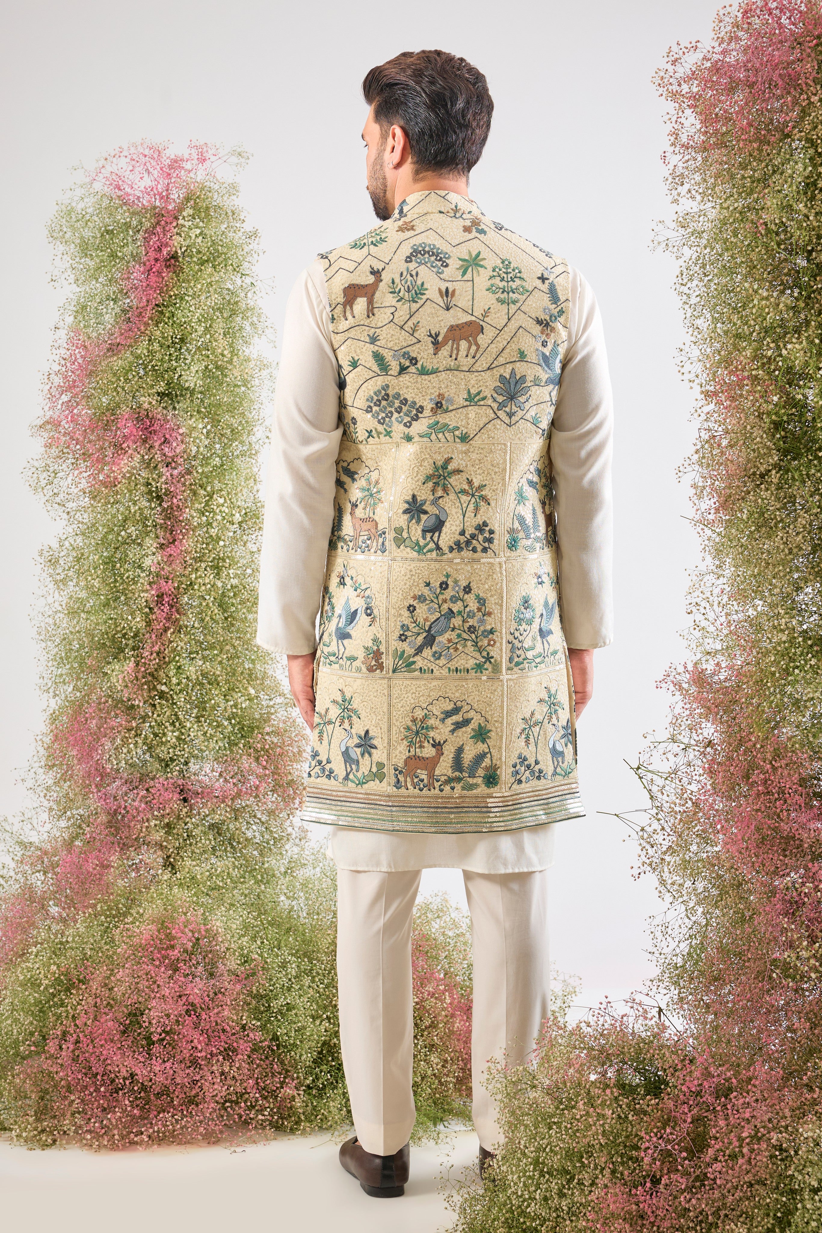 Cream luxury. Intricate beauty. Our Long Open Jacket features a dazzling sequined finish and detailed Flora and Fauna Interplay. Simply exquisite. 🦢