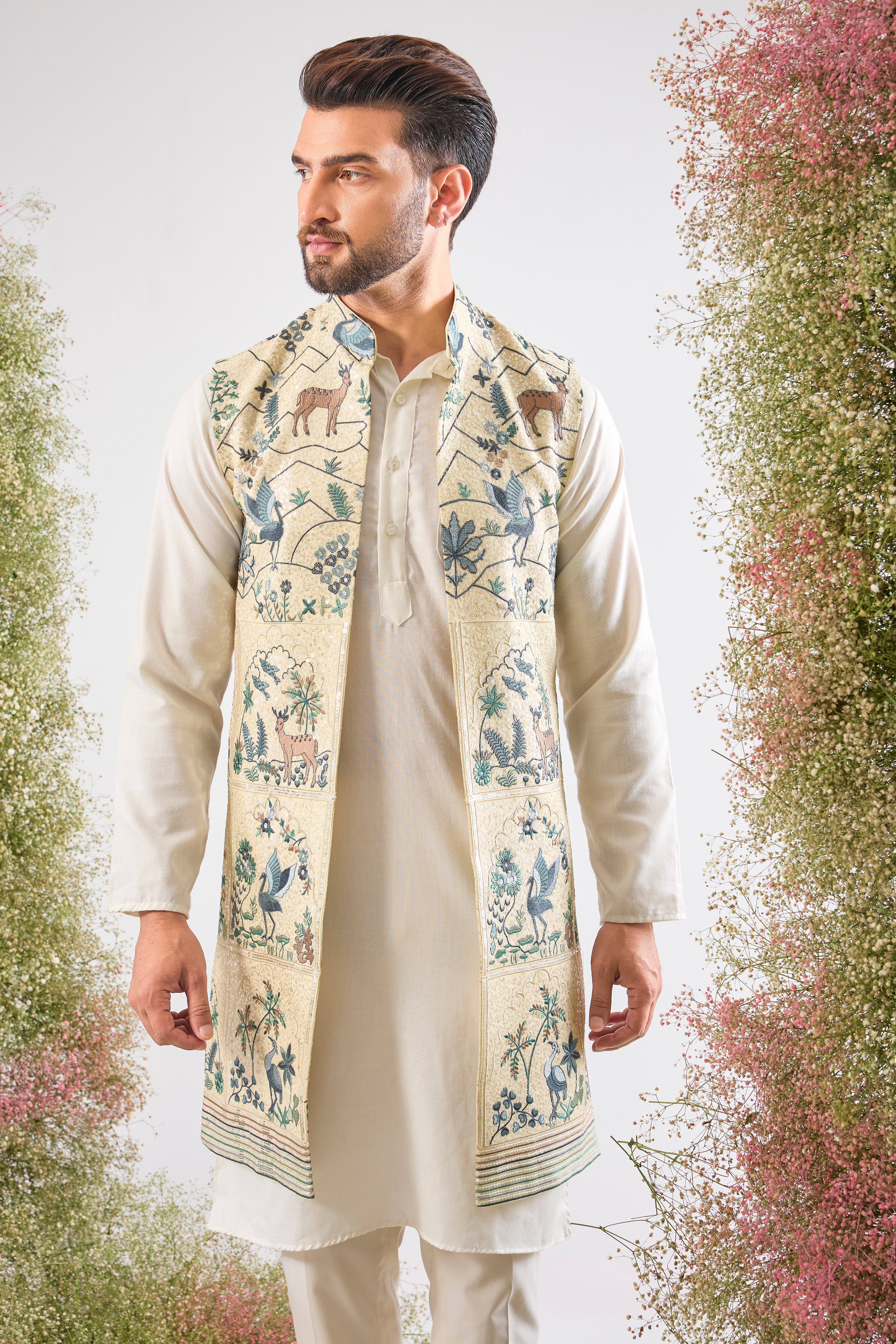 Cream luxury. Intricate beauty. Our Long Open Jacket features a dazzling sequined finish and detailed Flora and Fauna Interplay. Simply exquisite. 🦢