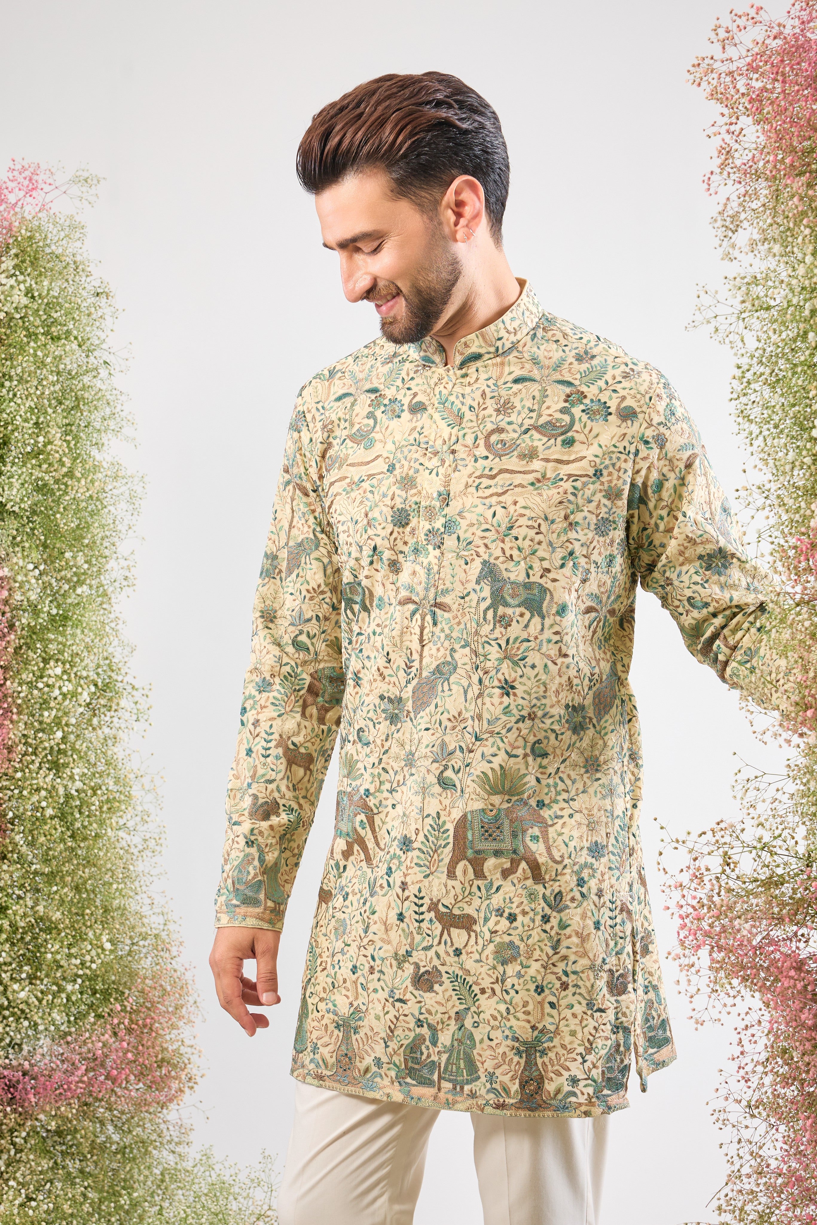 Creamy elegance. Intricate details. Our Short Kurta showcases beautiful Kashmiri Embroidery with charming Small Flora and Fauna Figures. A timeless classic. 🤍