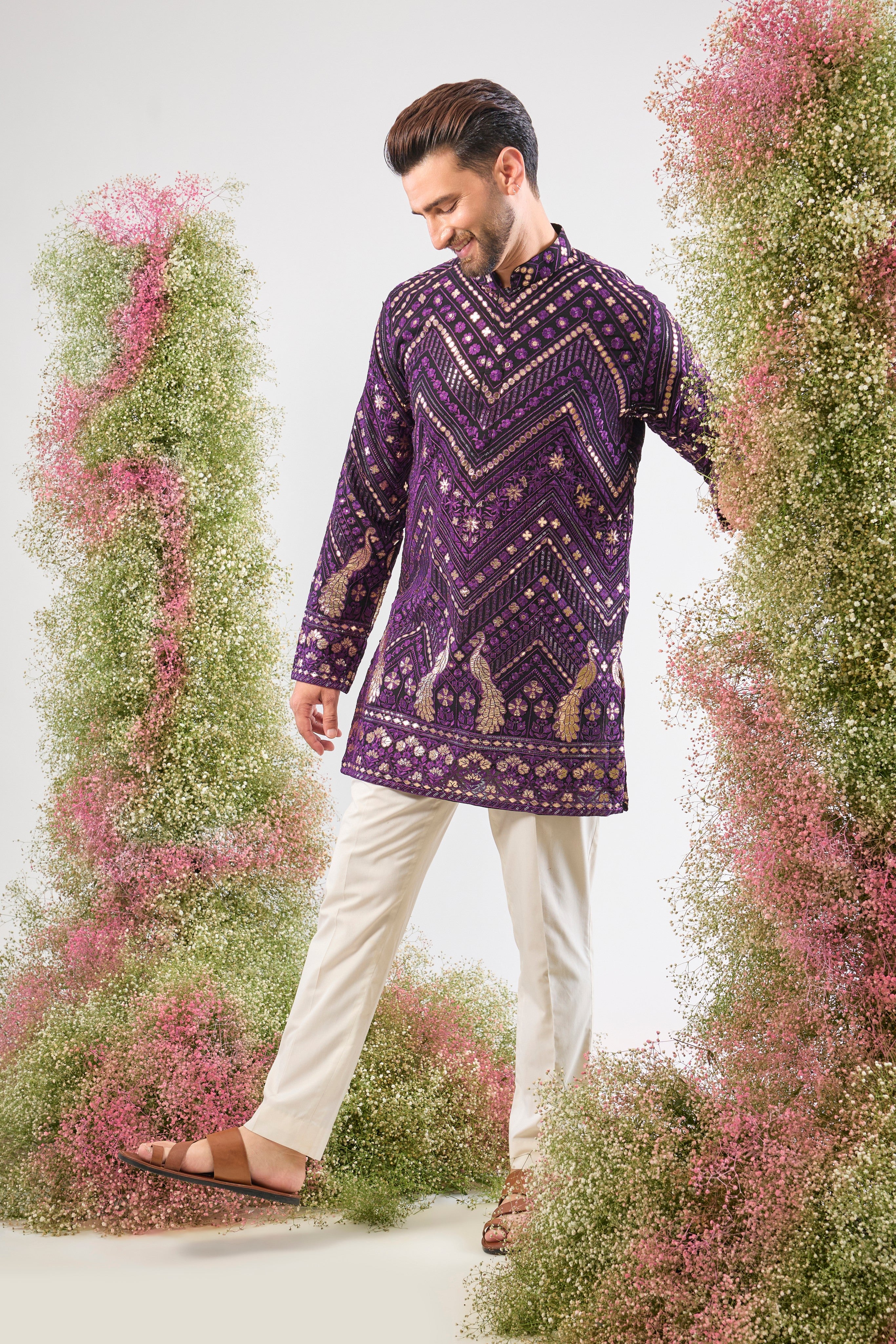 Bold Purple. Bold Texture. Our Short Kurta with Leather Patchwork and Intricate Peacock Motifs is pure artistry. 💜🦚