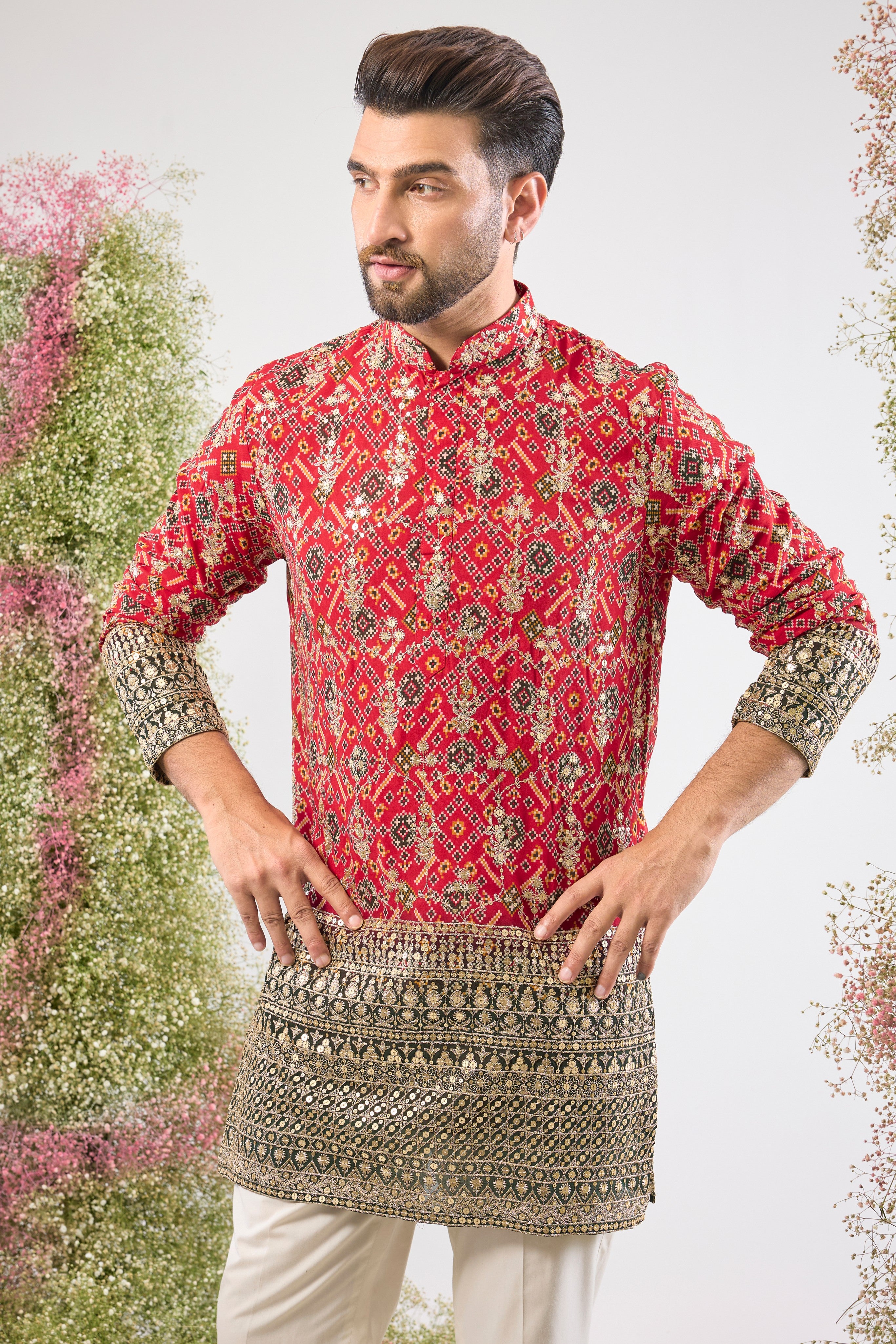 The perfect fusion! The classic appeal of Red Bandhani meets the grandeur of Intricate Zari and Sequin Work in this stunning Short Kurta. The textures and shine create a look of opulent elegance. 👑