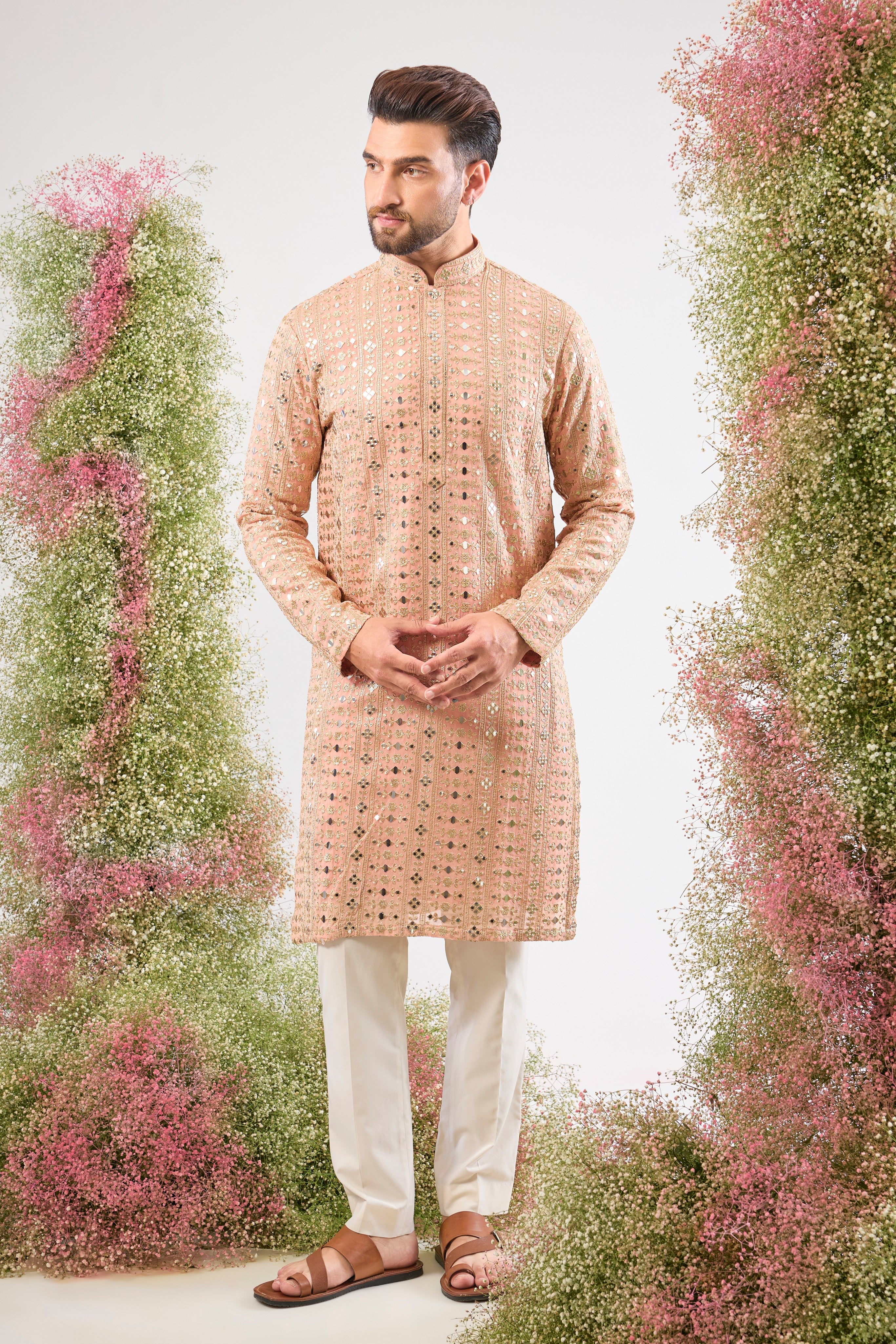 Dazzling peach. Maximum shine. Our Kurta features Heavy Sequin Work that mimics a mirror shine, complemented by Intricate Thread Work. You'll steal the show! 💫