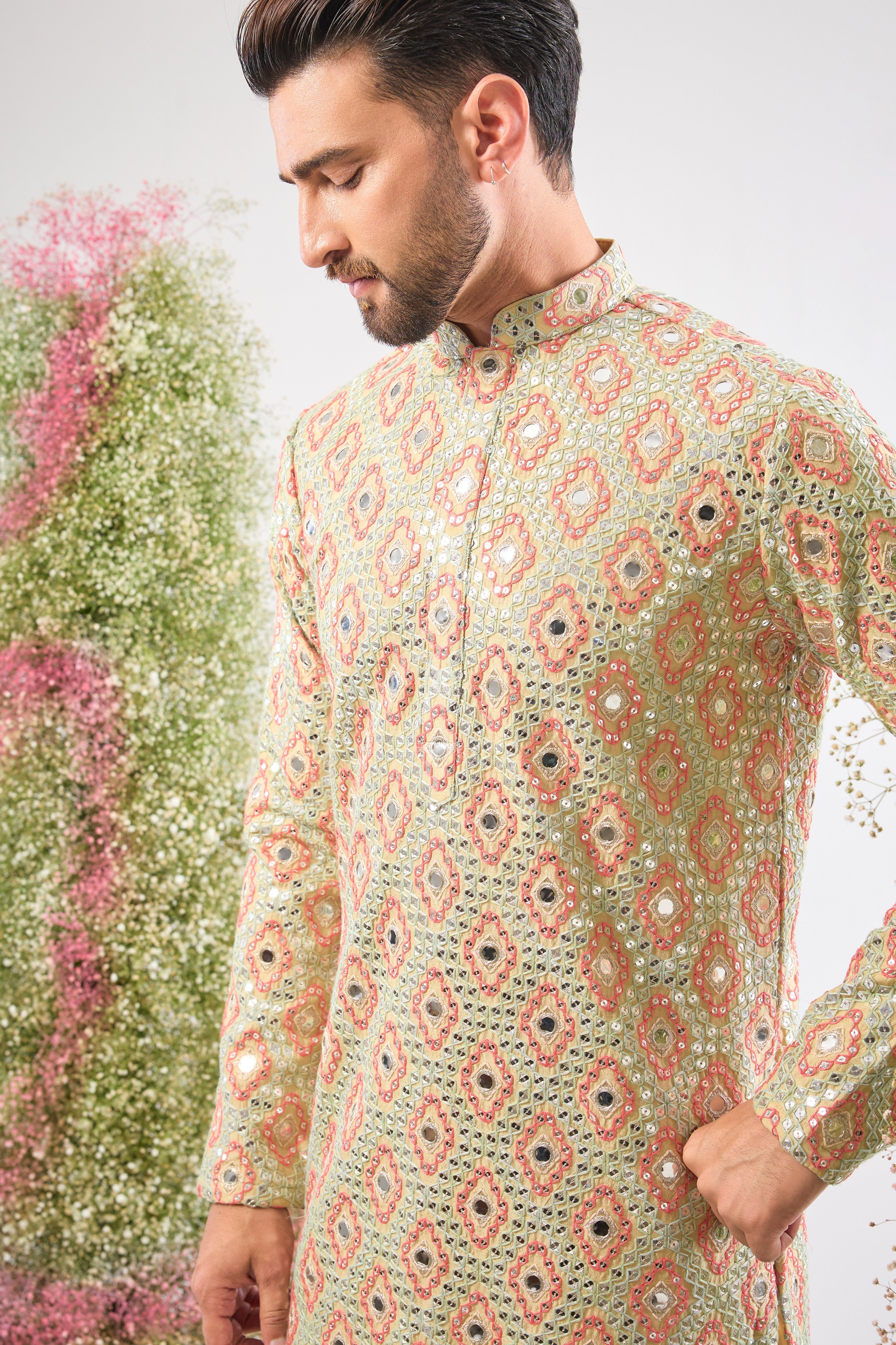 Cream brilliance. Colourful art. Our Short Kurta shines with mirror-effect Intricate Sequin Work and vibrant Multi-coloured Thread Work. Simply stunning!